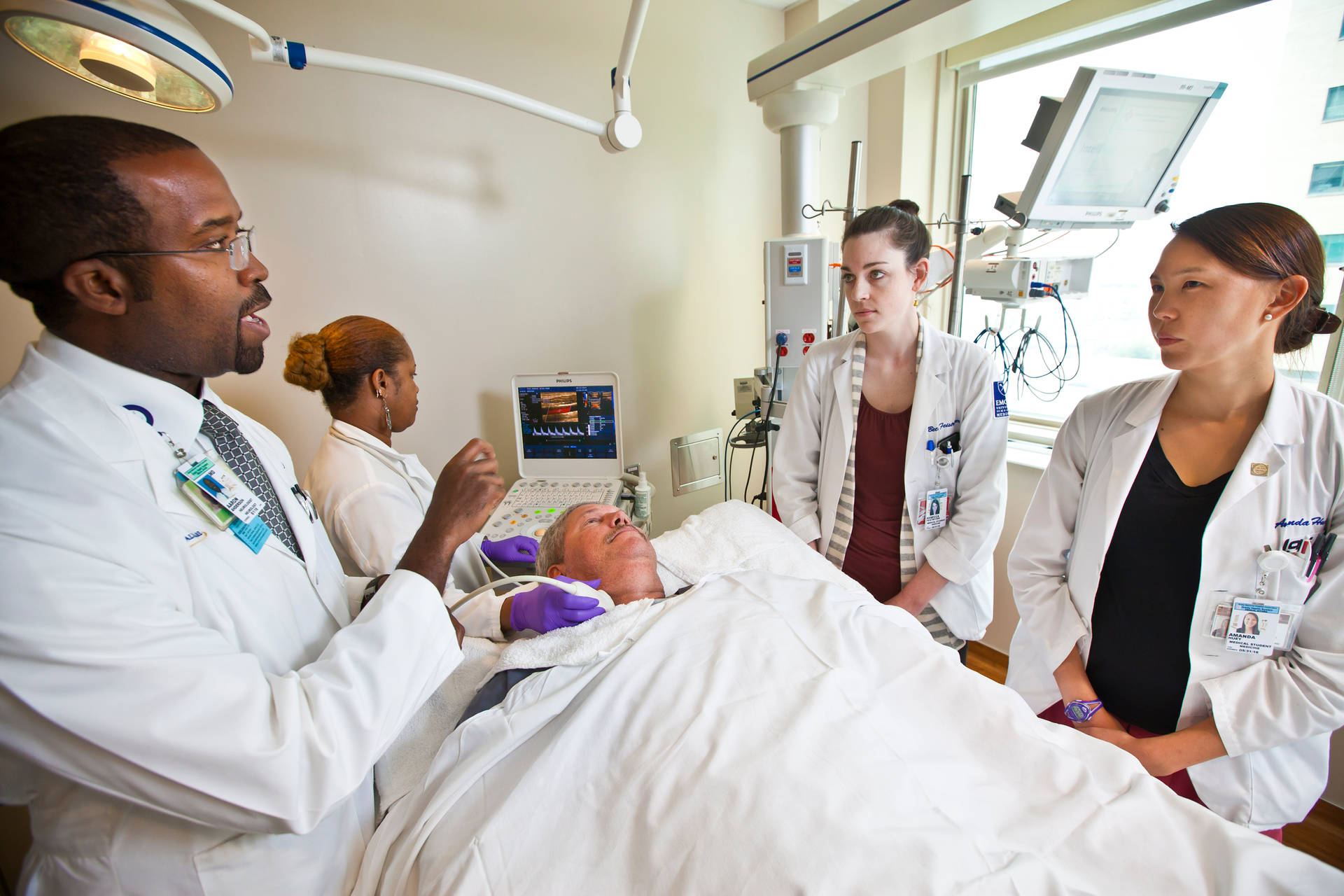 Doctors Surrounding Patient Background