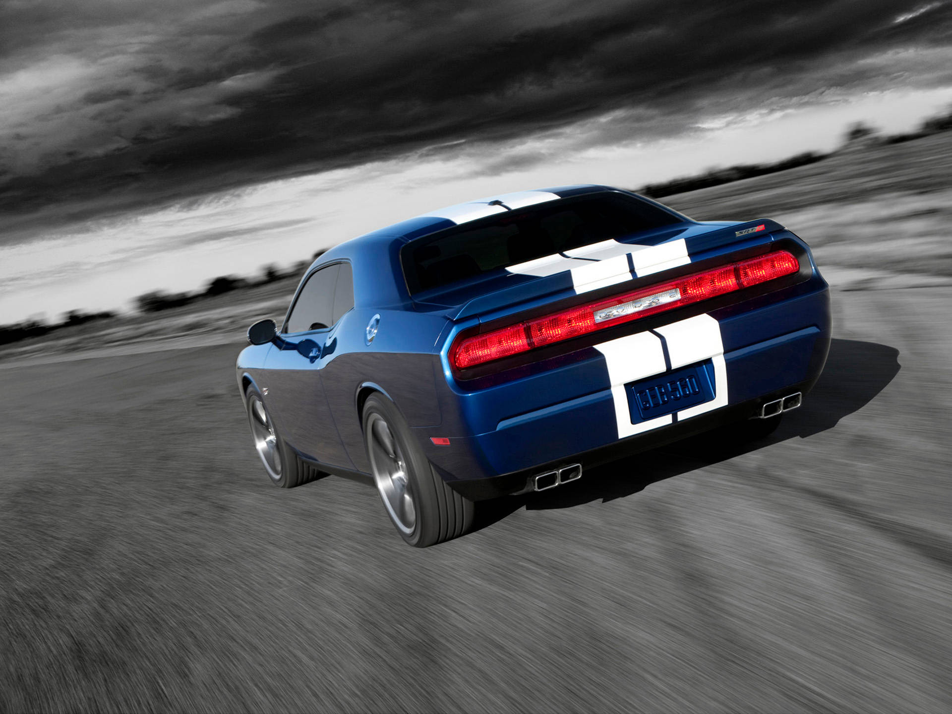 Dodge Challenger In An Asphalt Road Background