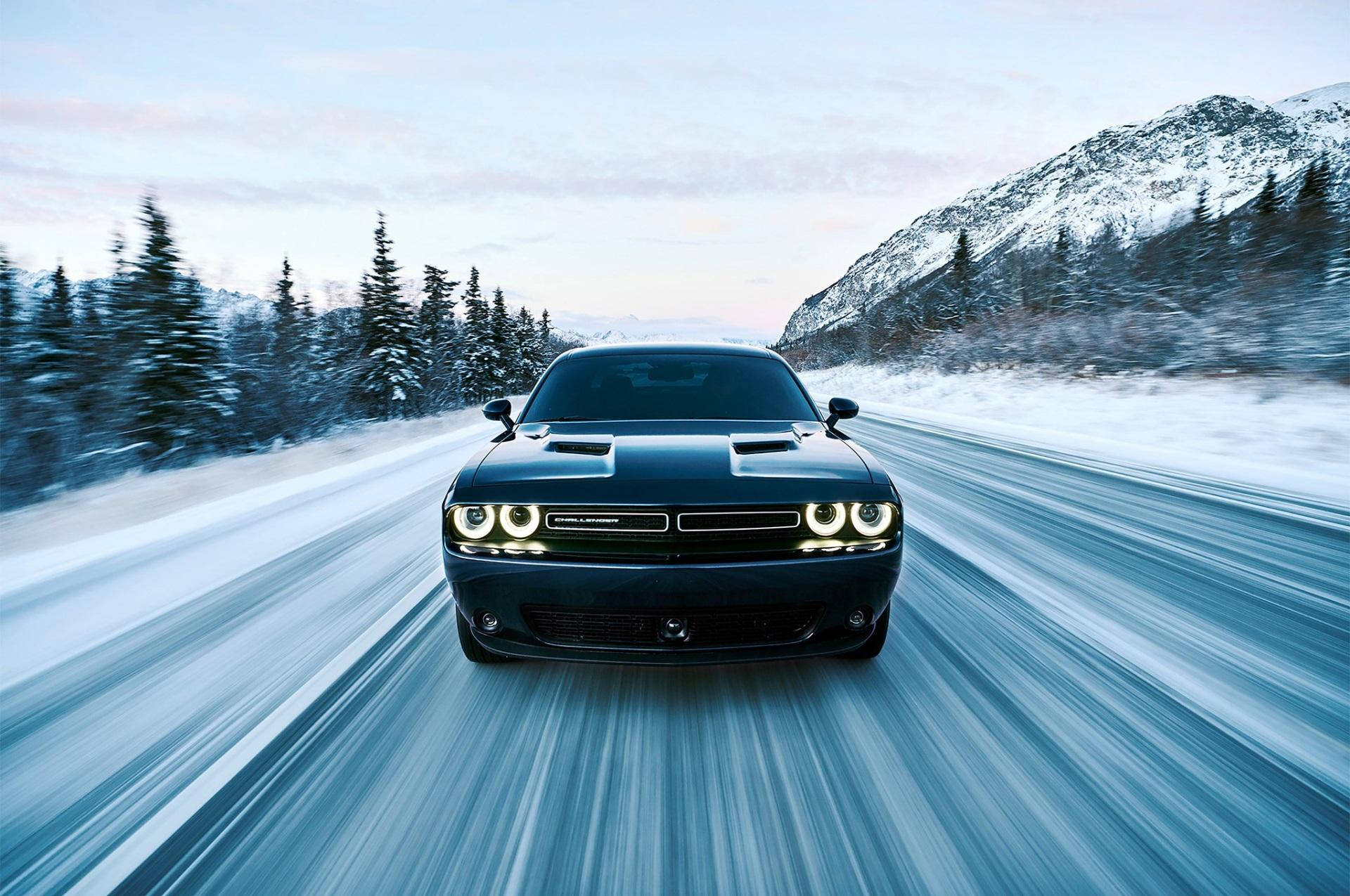 Dodge Challenger In Snowy Road Background