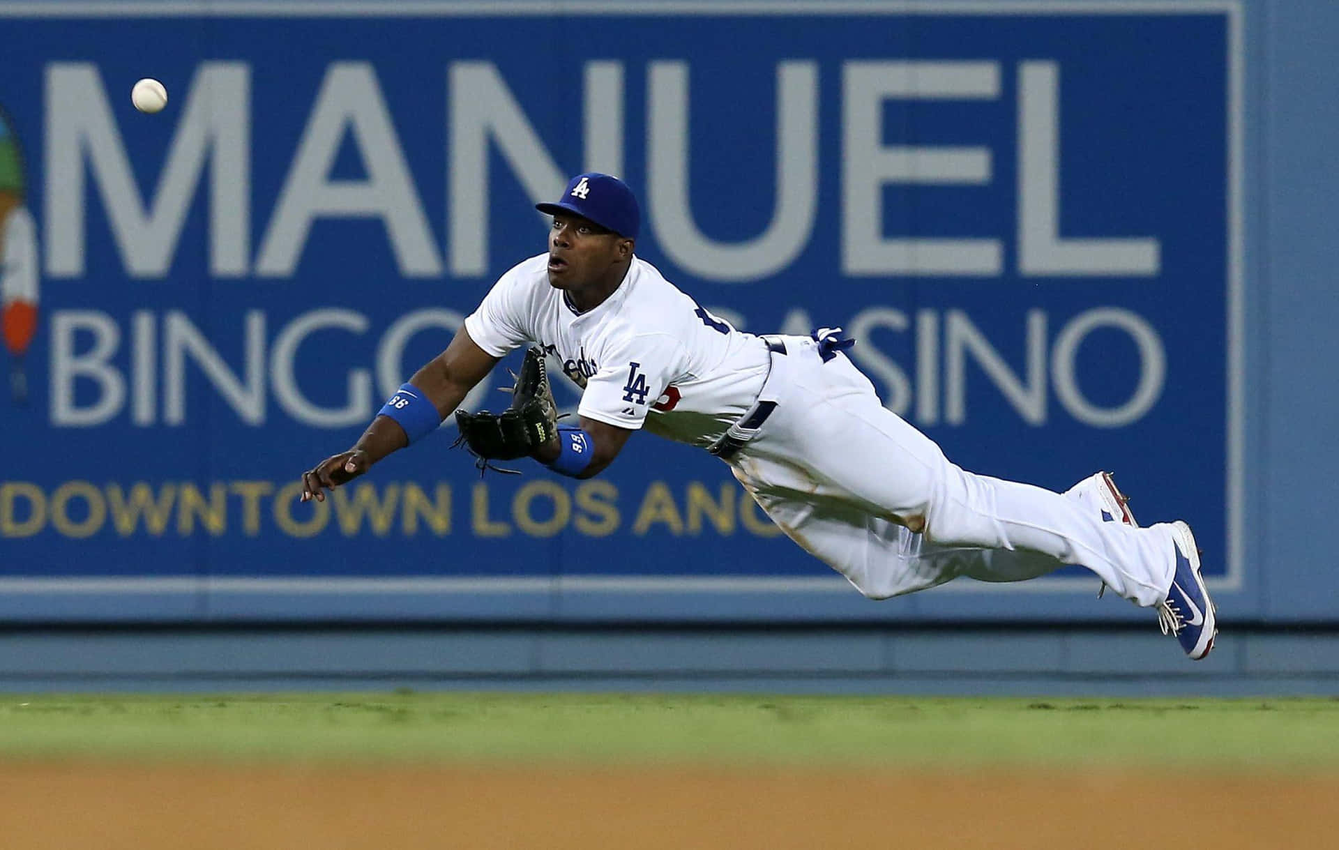 Dodgers Player Diving Catch Background
