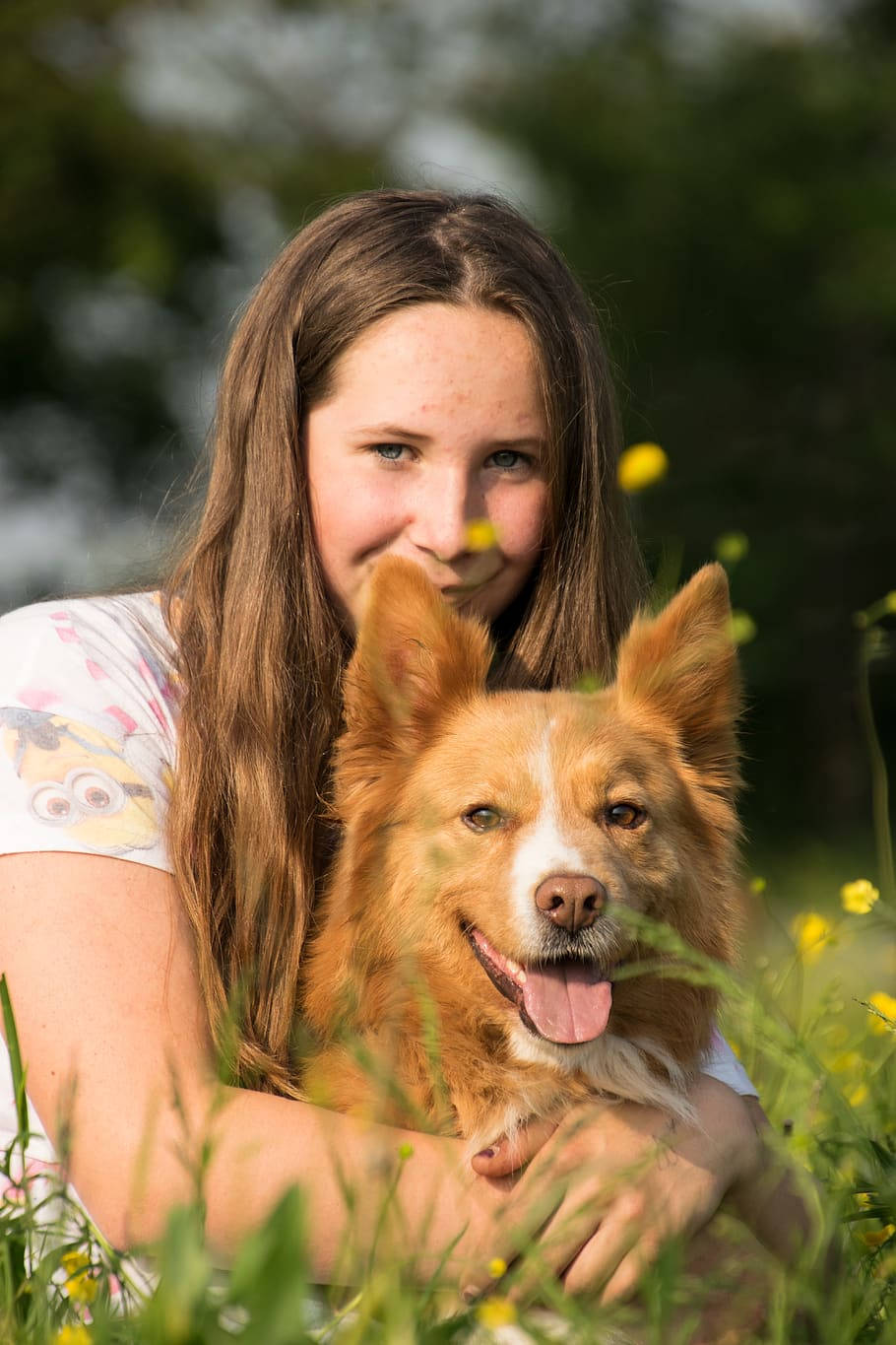 Dog And Girl Looking At The Camera Background