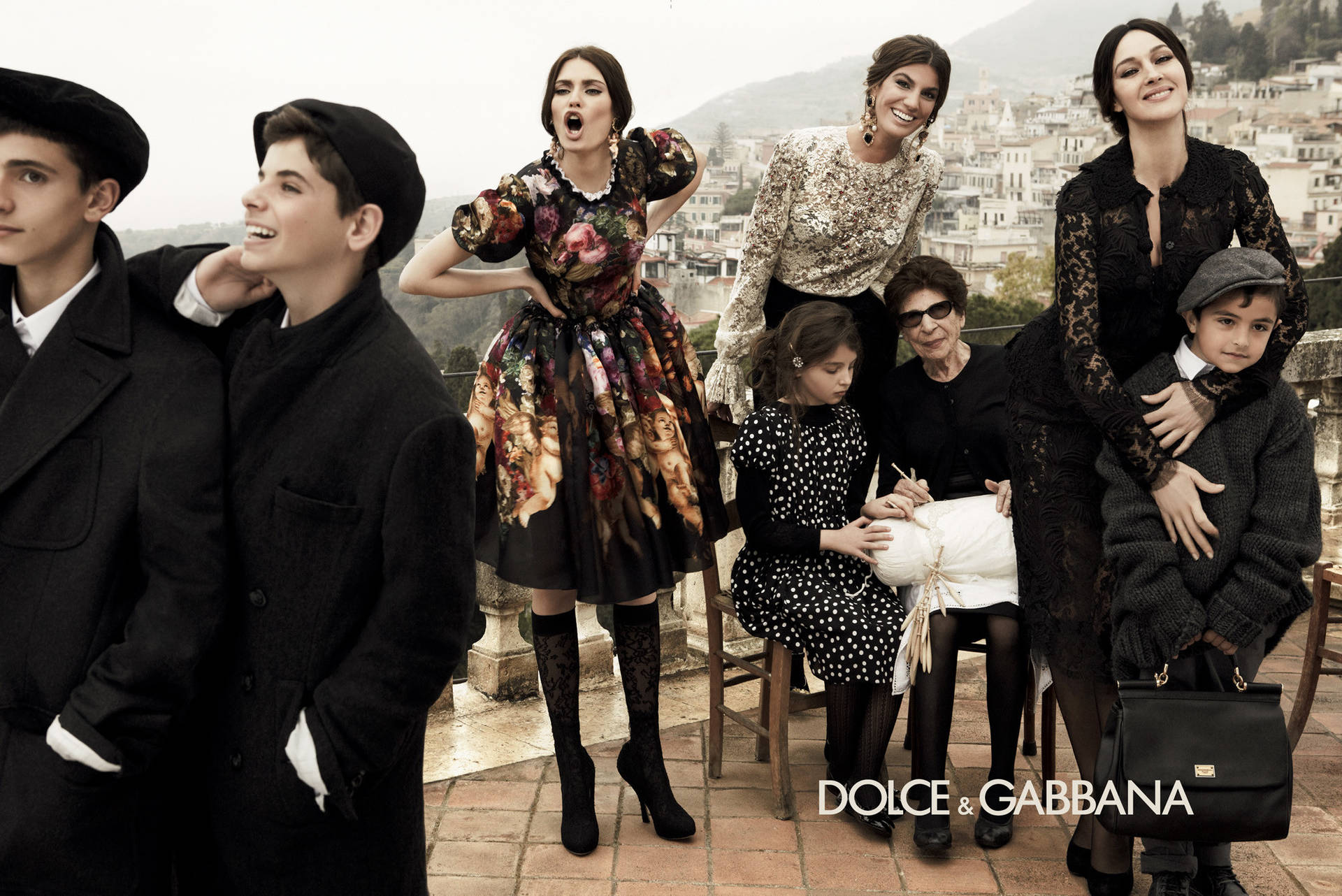 Dolce And Gabbana Models Outside In Black Clothing Background