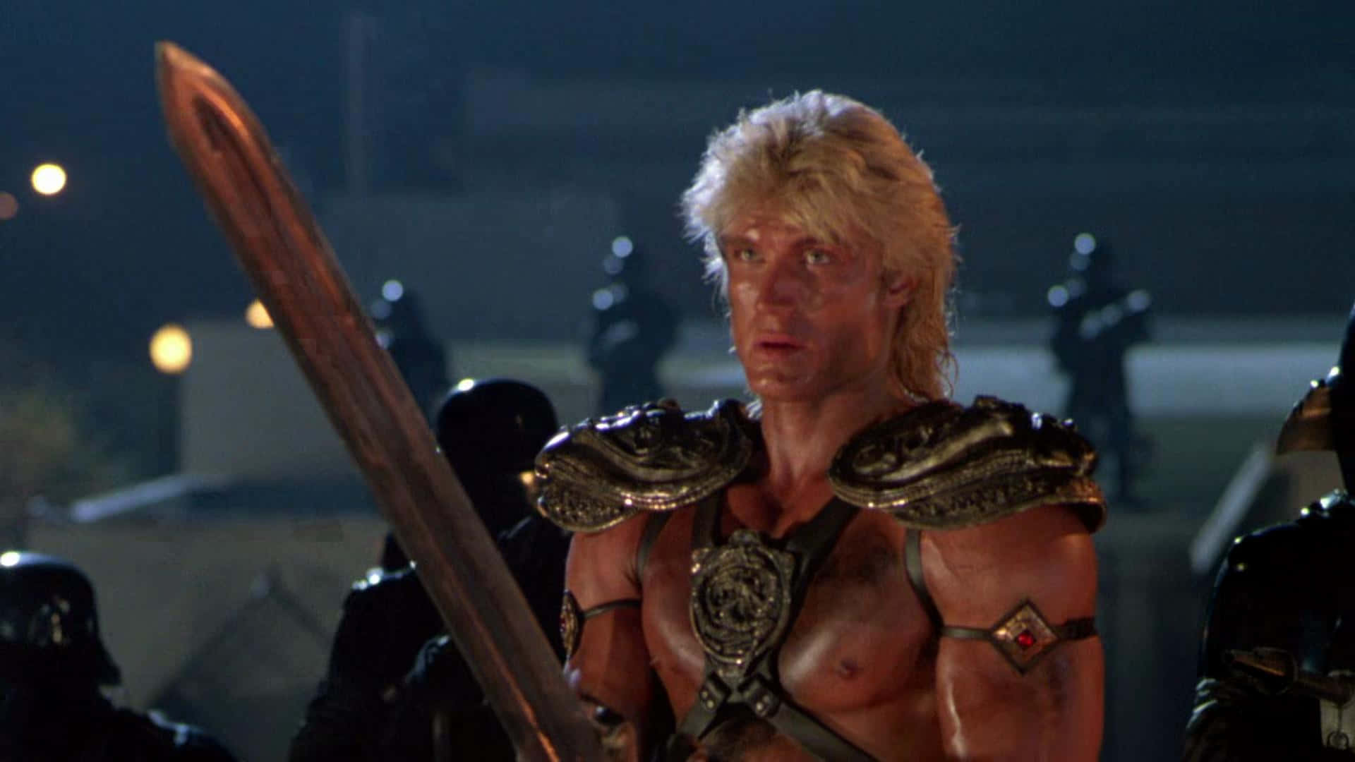 Dolph Lundgren Posing For A Photo Shoot. Background
