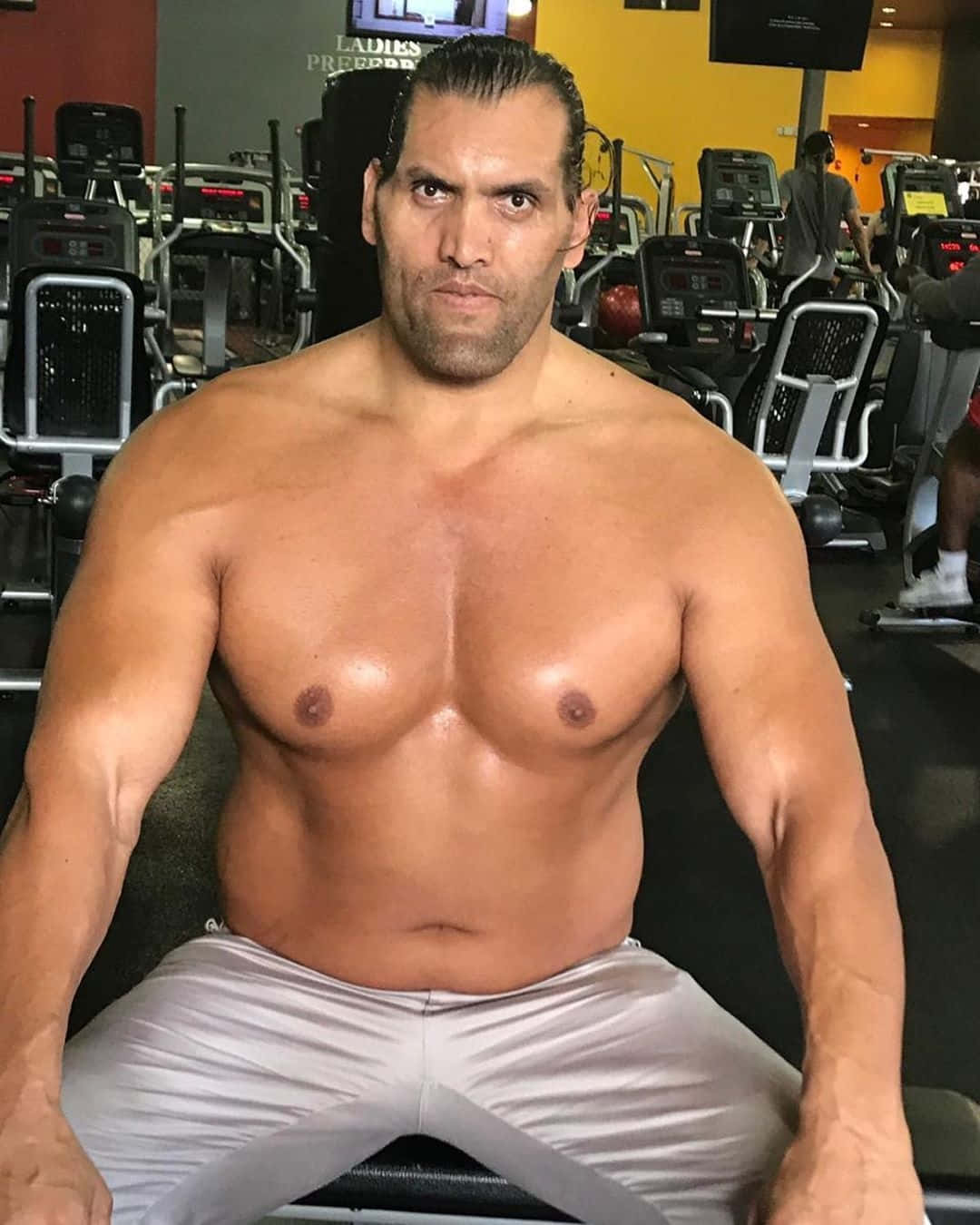 Dominating Strength - The Great Khali At Gym Background