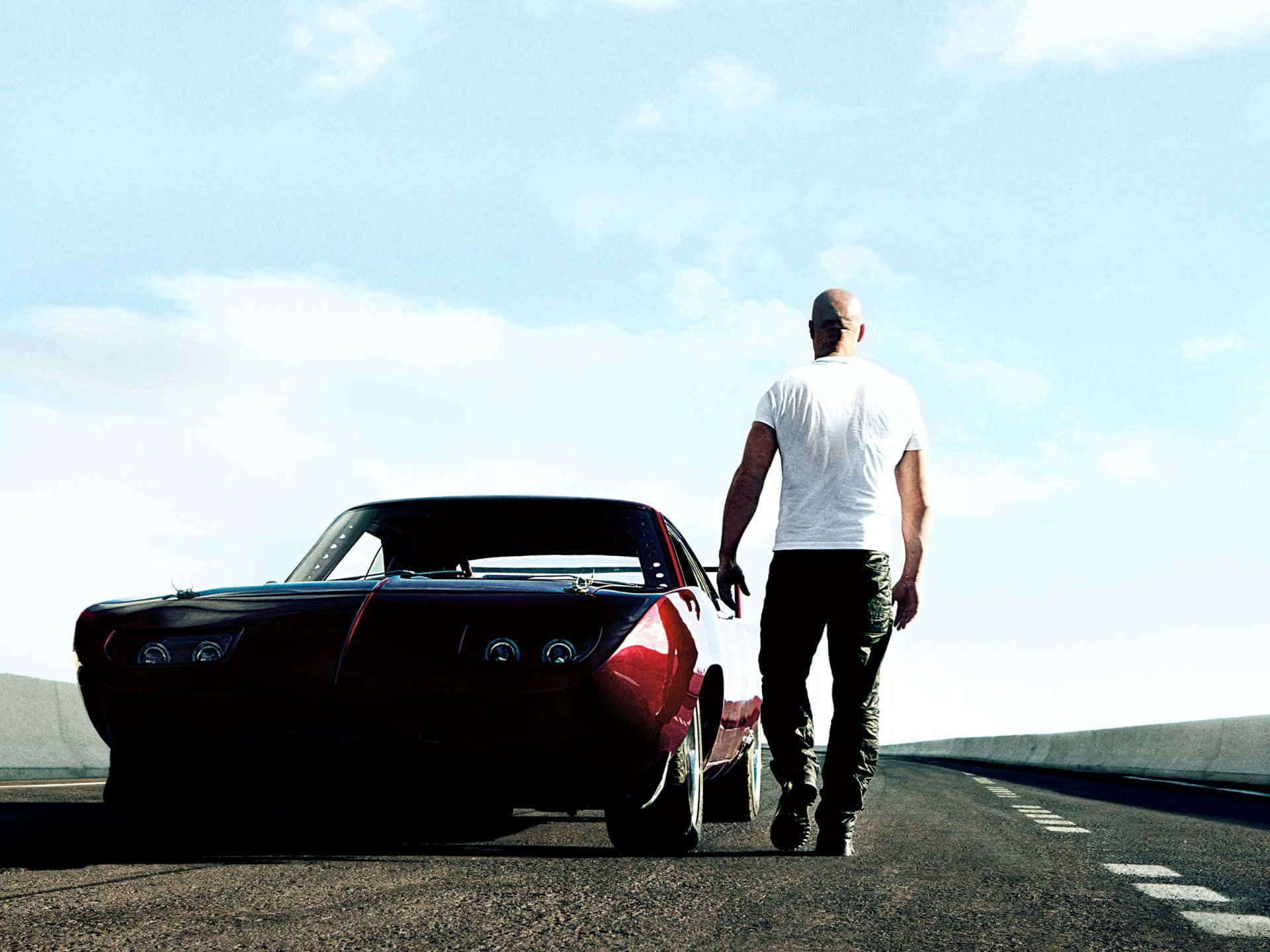 Dominic Checking His Car Fast And Furious 1 Background