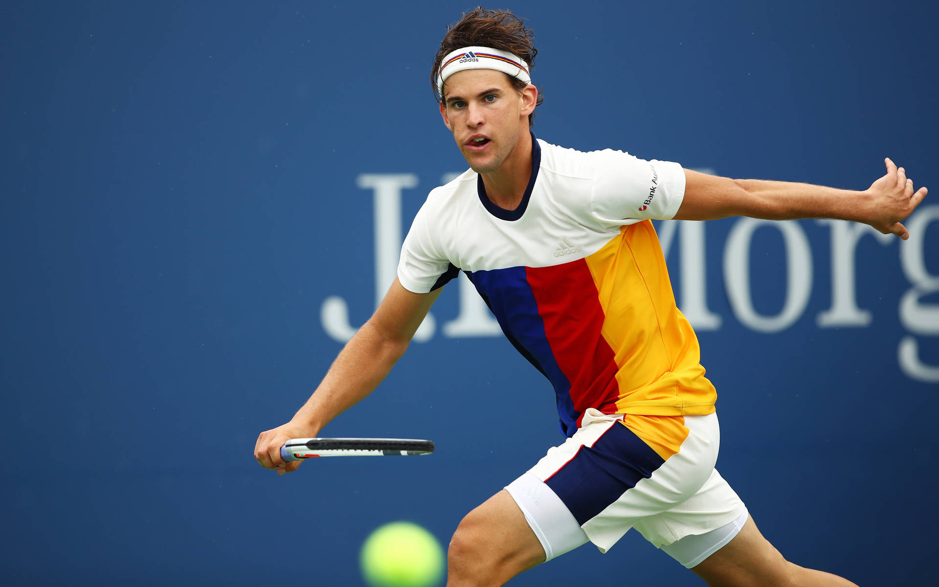 Dominic Thiem With Colourful Outfit Background