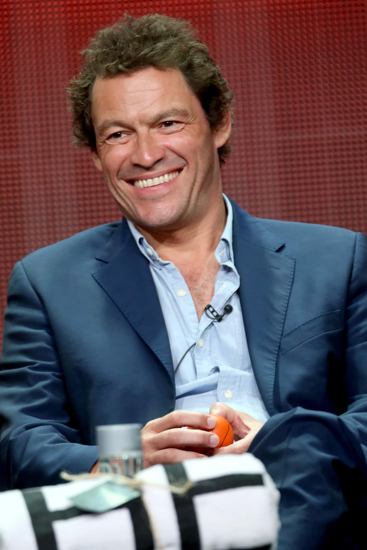 Dominic West - Charming British Excellence Background