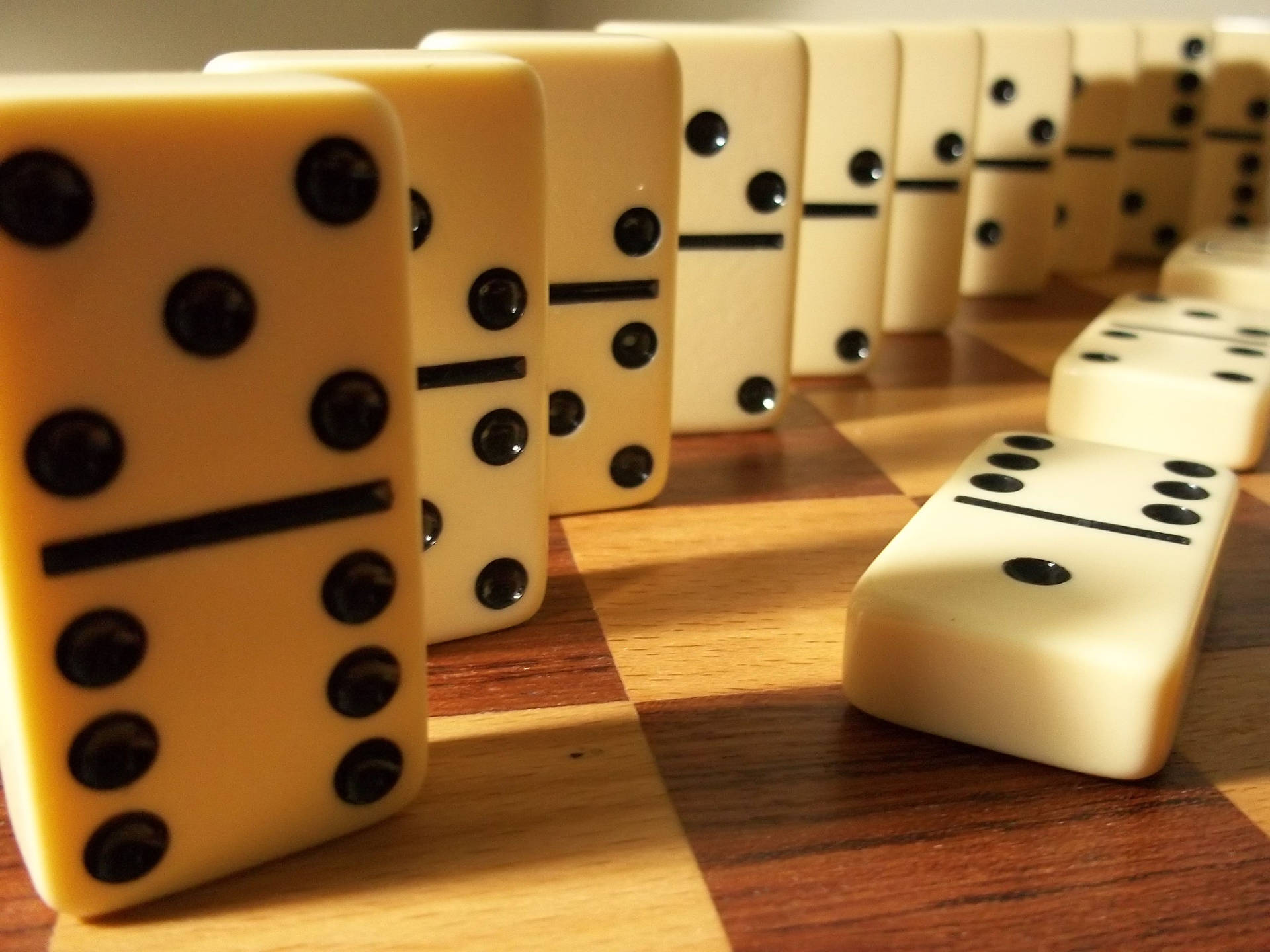 Dominos On A Checker Board Background