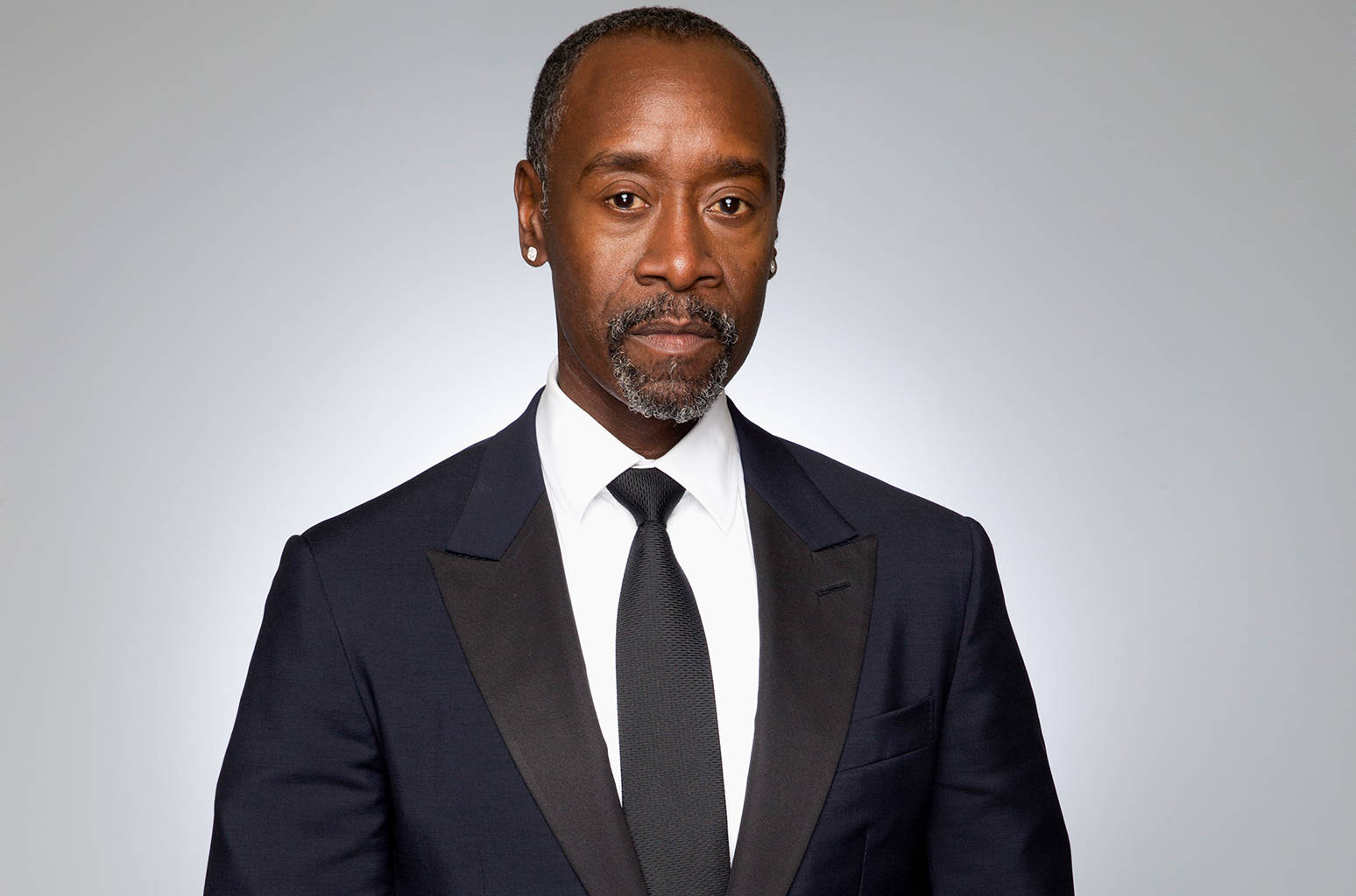 Don Cheadle Posing In Studio Background