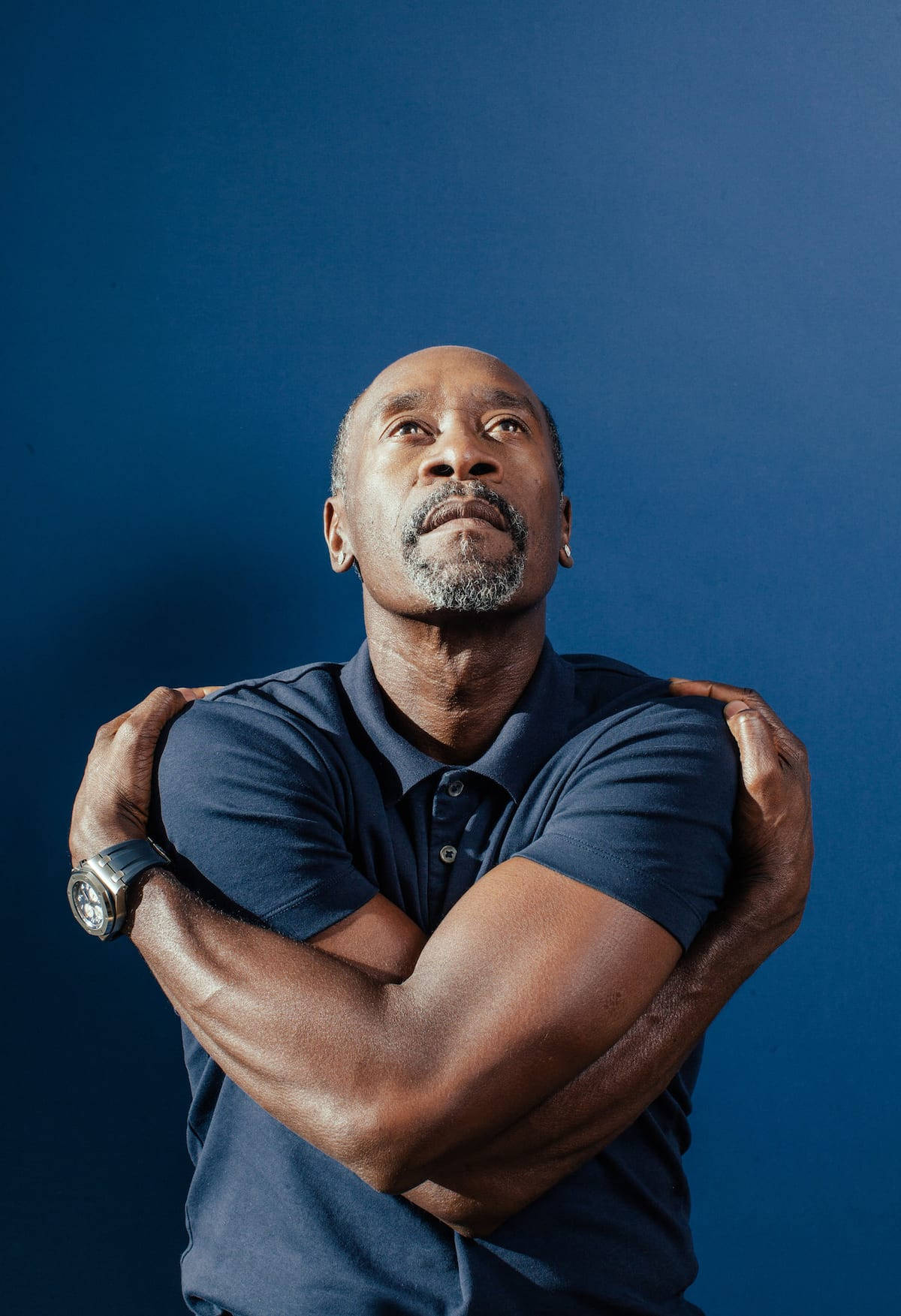 Don Cheadle Self-hug Background