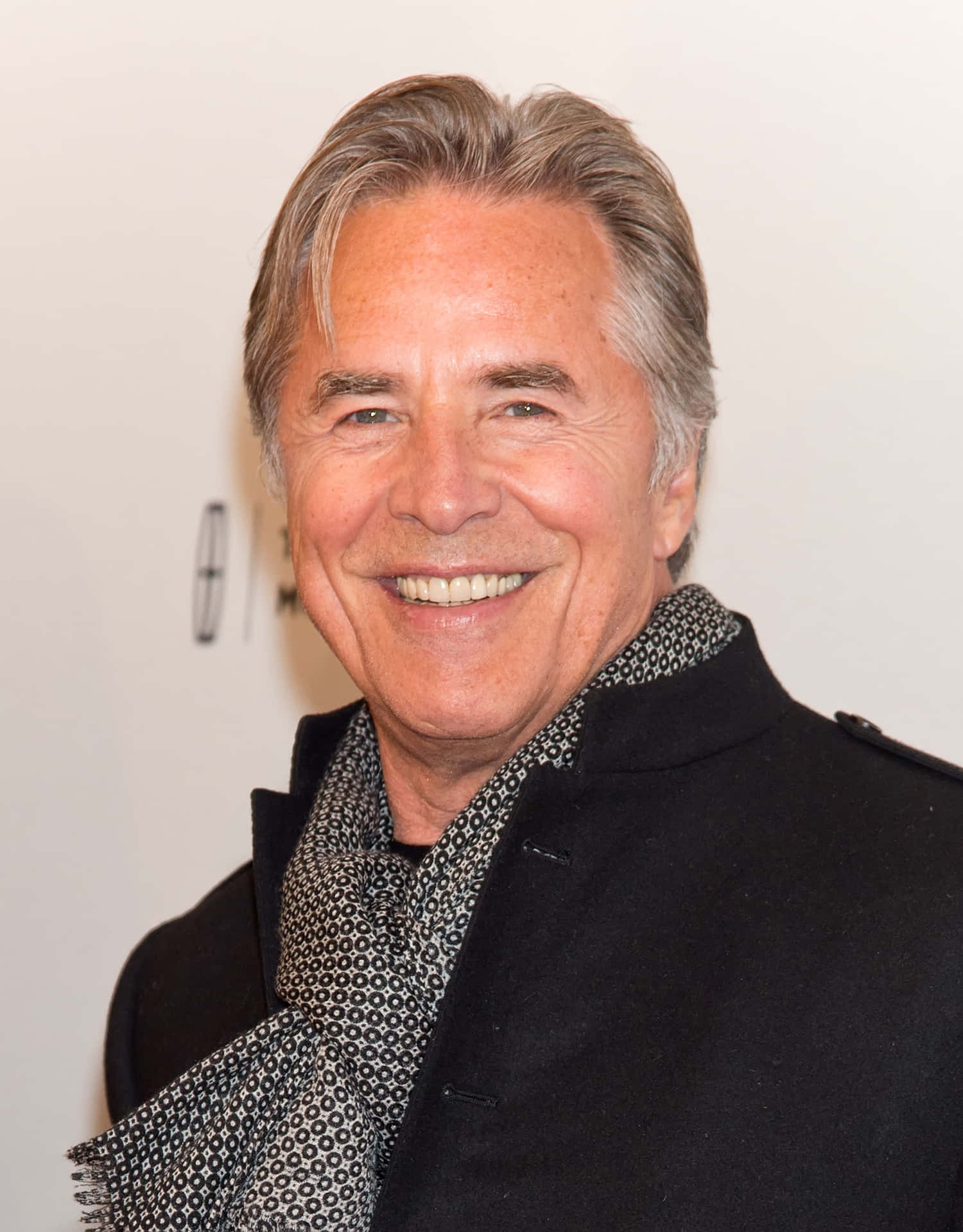 Don Johnson Looking Cool In Black Sunglasses Background