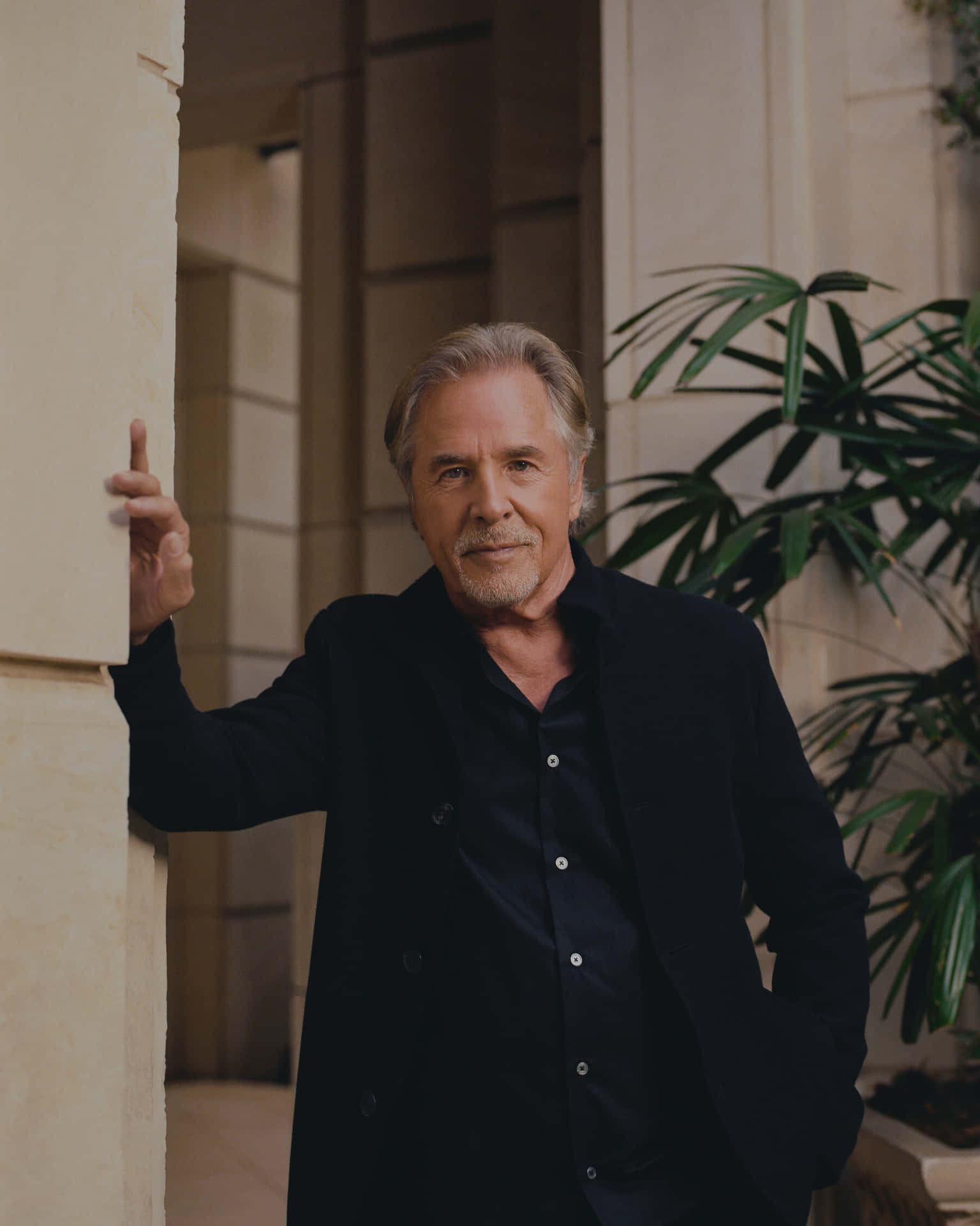 Don Johnson Looking Stylish In His Signature Cowboy Hat. Background