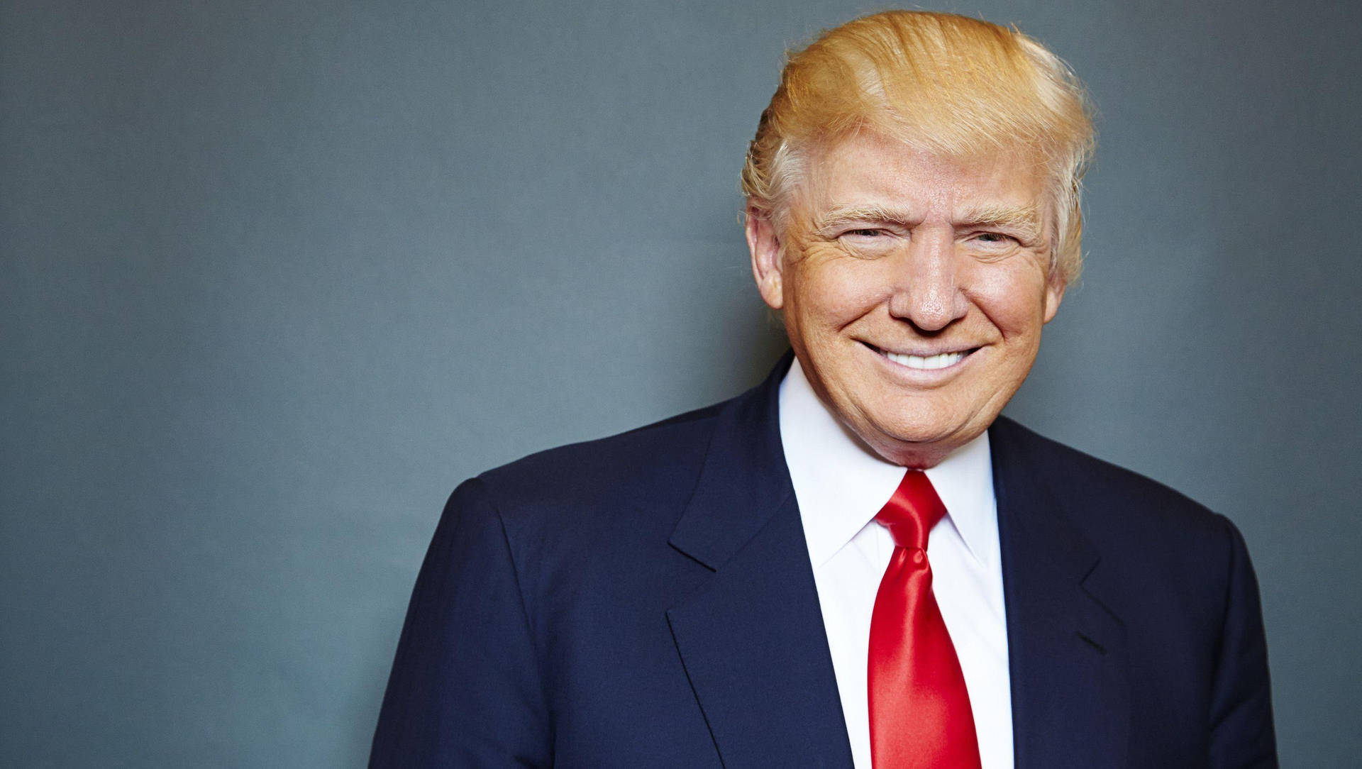 Donald Trump Smiling On Gray Background Background