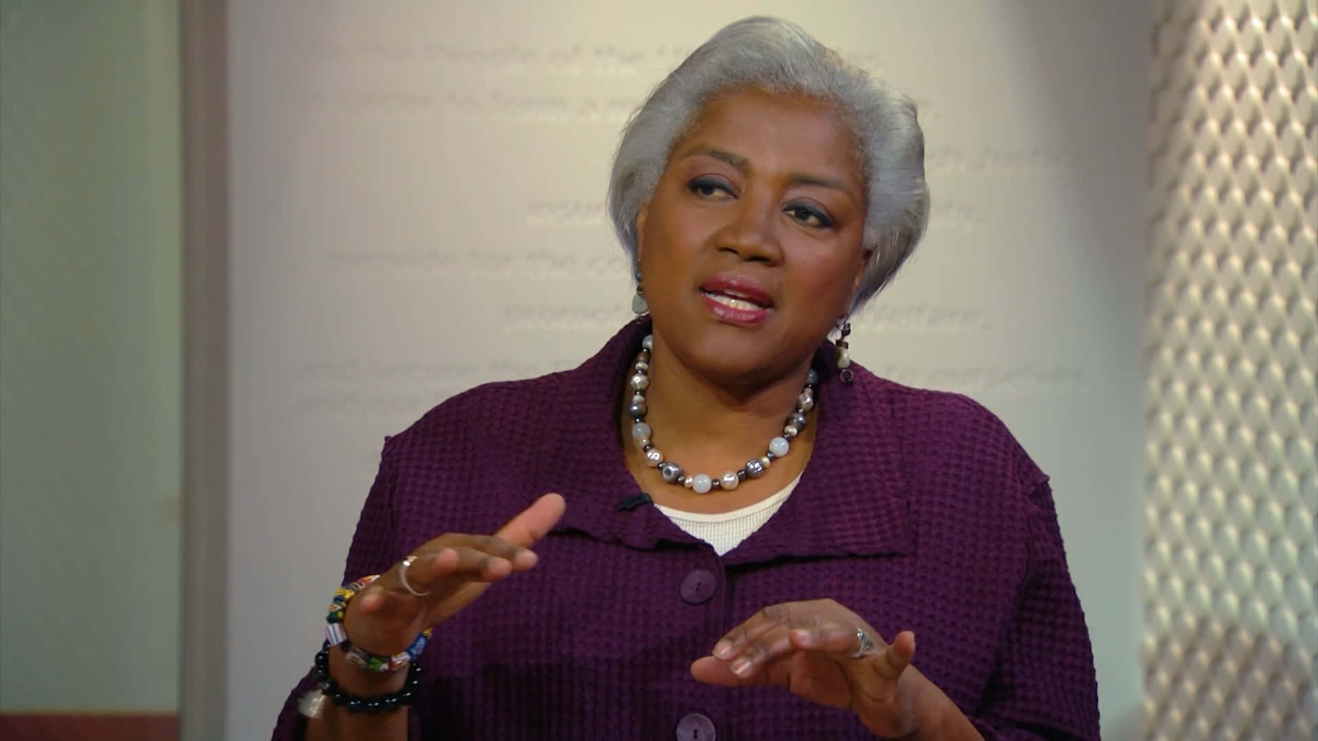 Donna Brazile At An Event, Addressing The Audience With Her Insightful Speech. Background