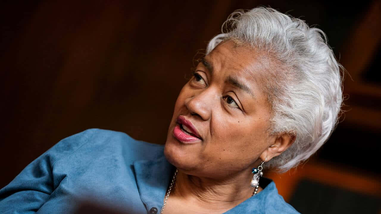 Donna Brazile Delivering A Powerful Speech Background