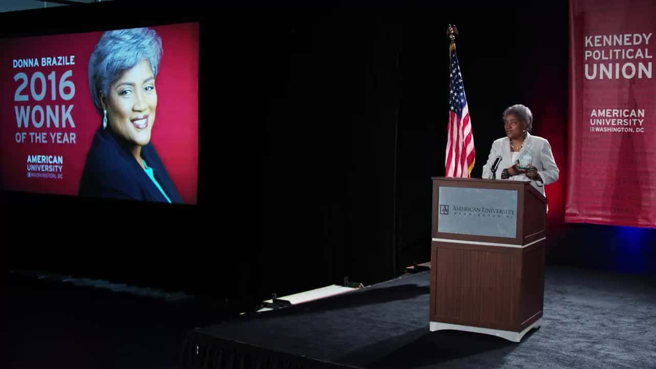 Donna Brazile Delivering Speech At An Event Background