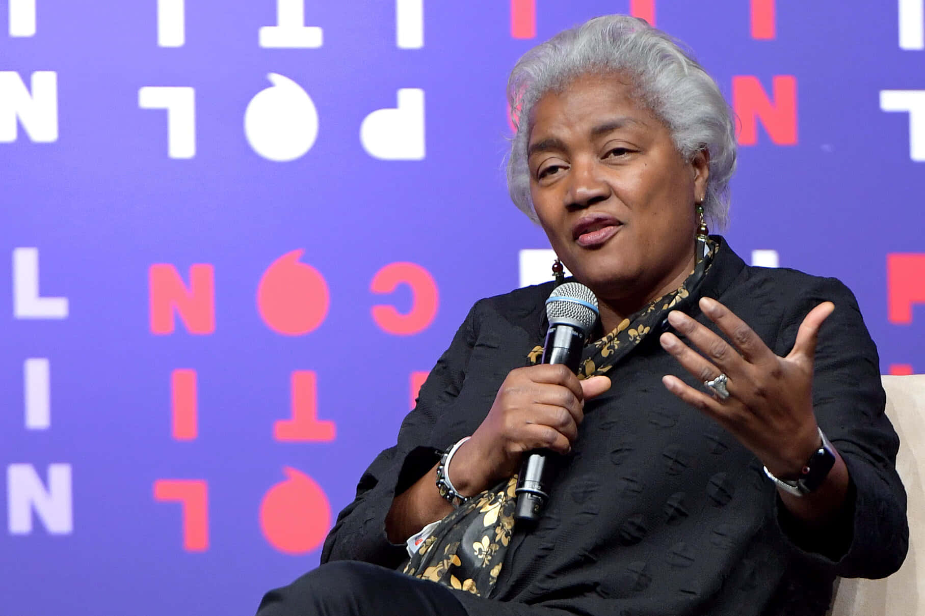 Donna Brazile Engaged In Discussion Background