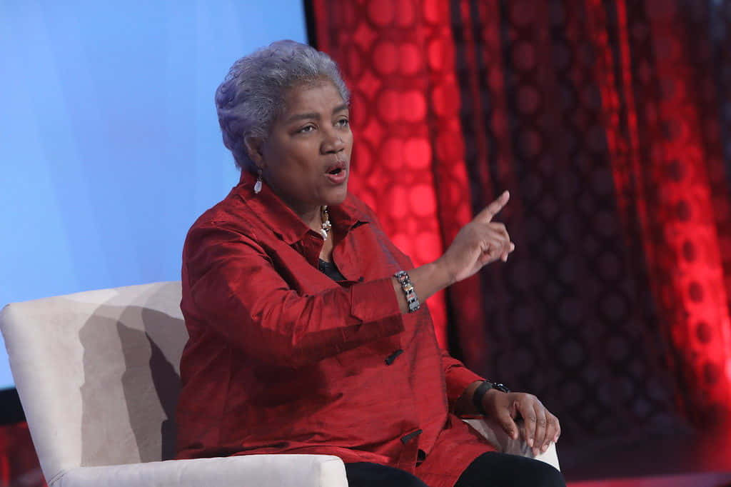 Donna Brazile Speaking At An Event Background