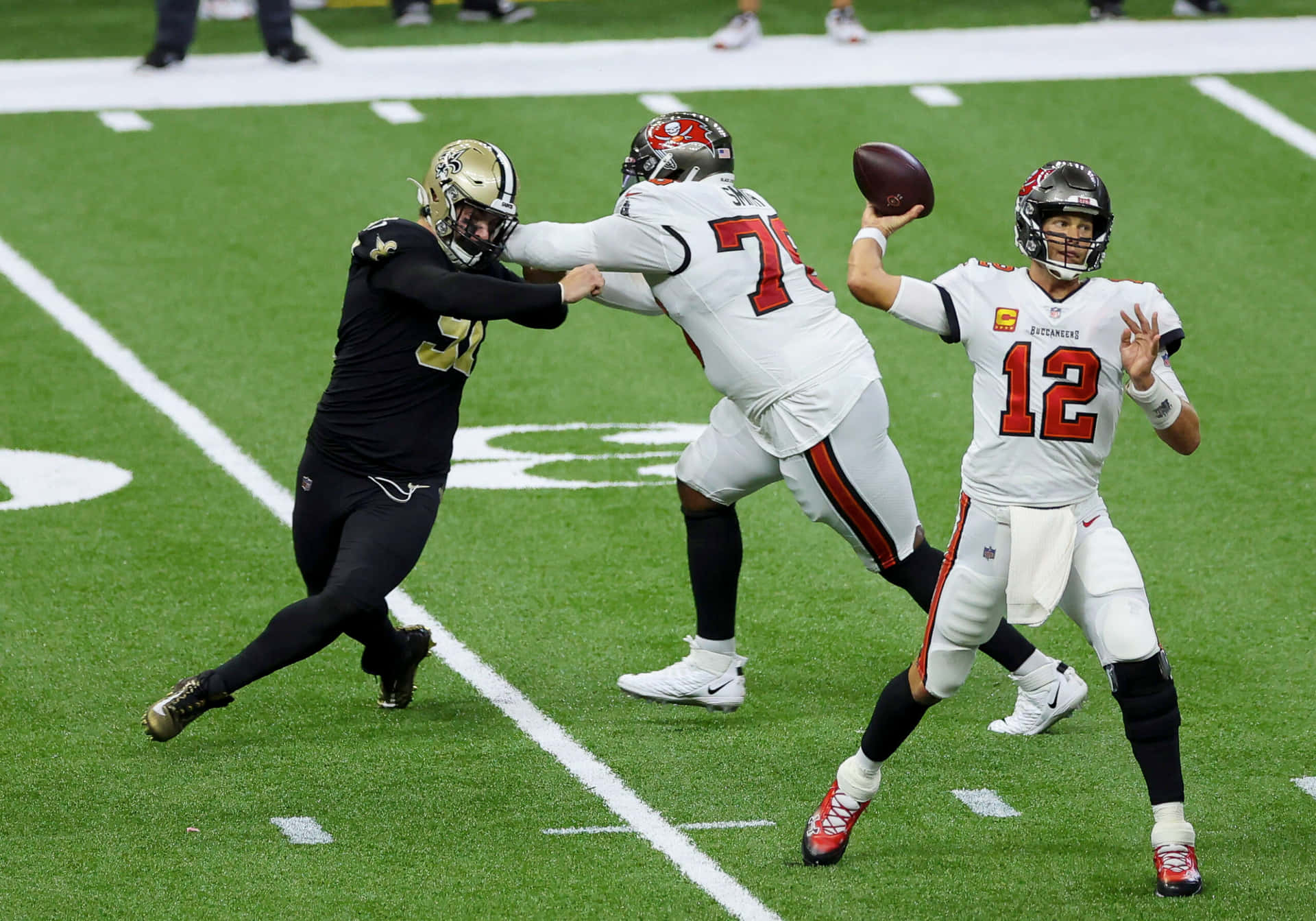 Donovan Smith Protecting Teammate Tom Brady Background
