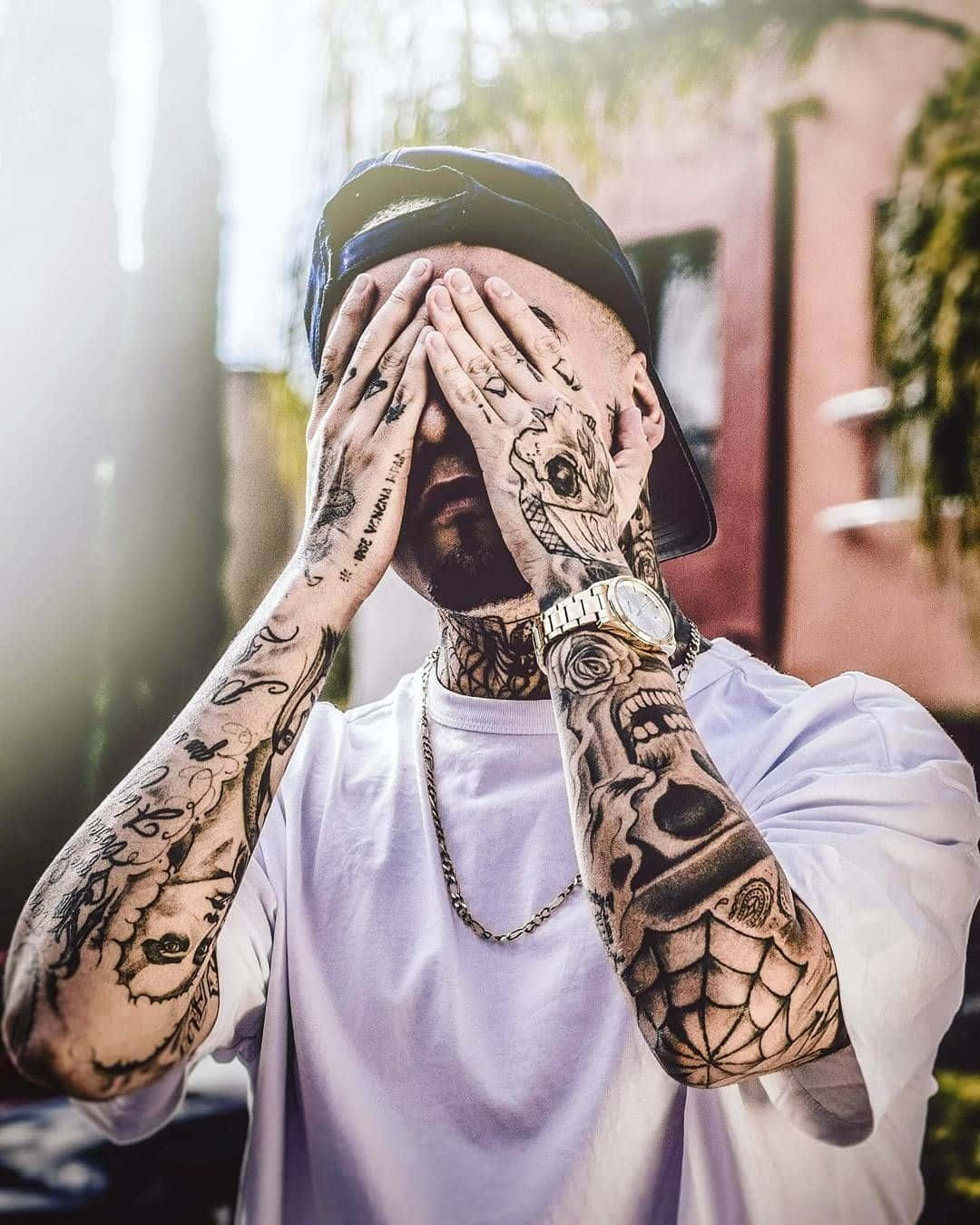 Dope Boy With Arm Tattoos Background