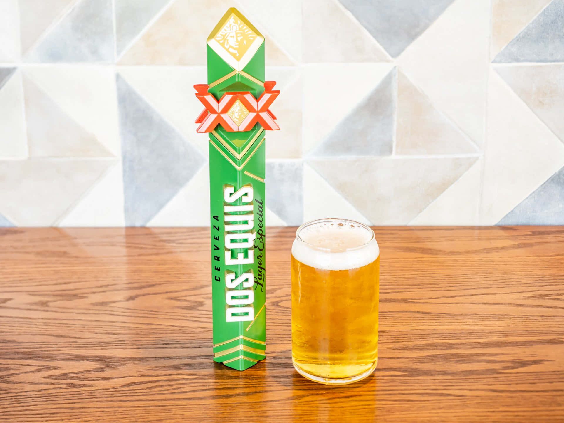 Dos Equis Beer Tapand Glasson Table Background