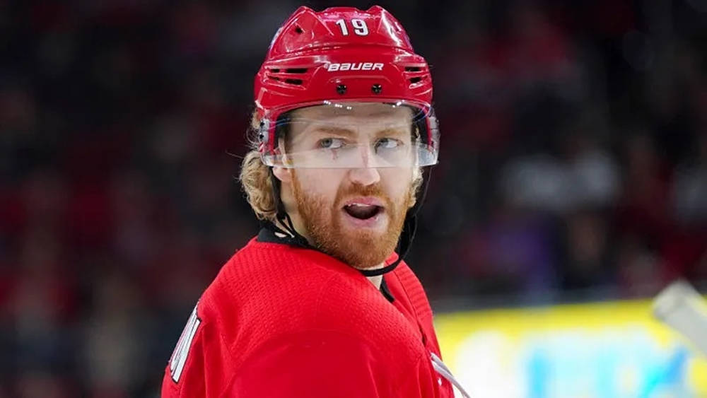 Dougie Hamilton, Key Player For Carolina Hurricanes, In Action Background