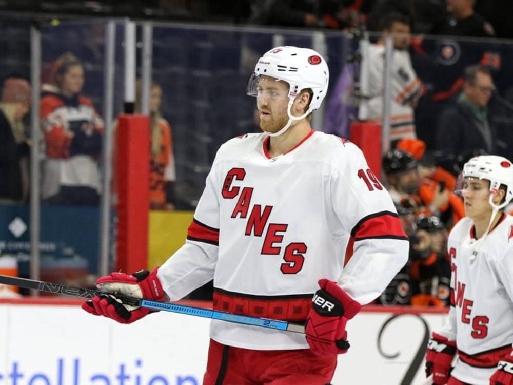 Dougie Hamilton Of Carolina Hurricanes In Action Against Colorado Avalanche Background