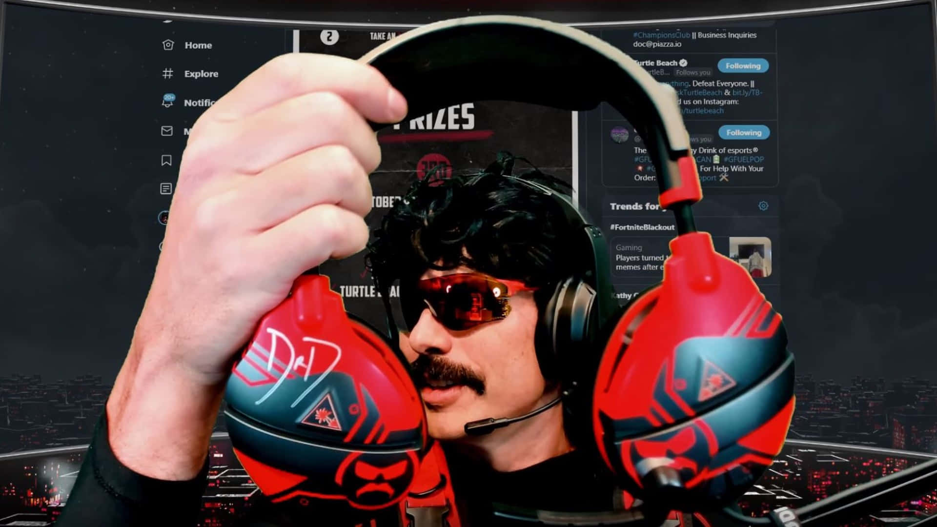 Dr Disrespect Showing Red Headphone