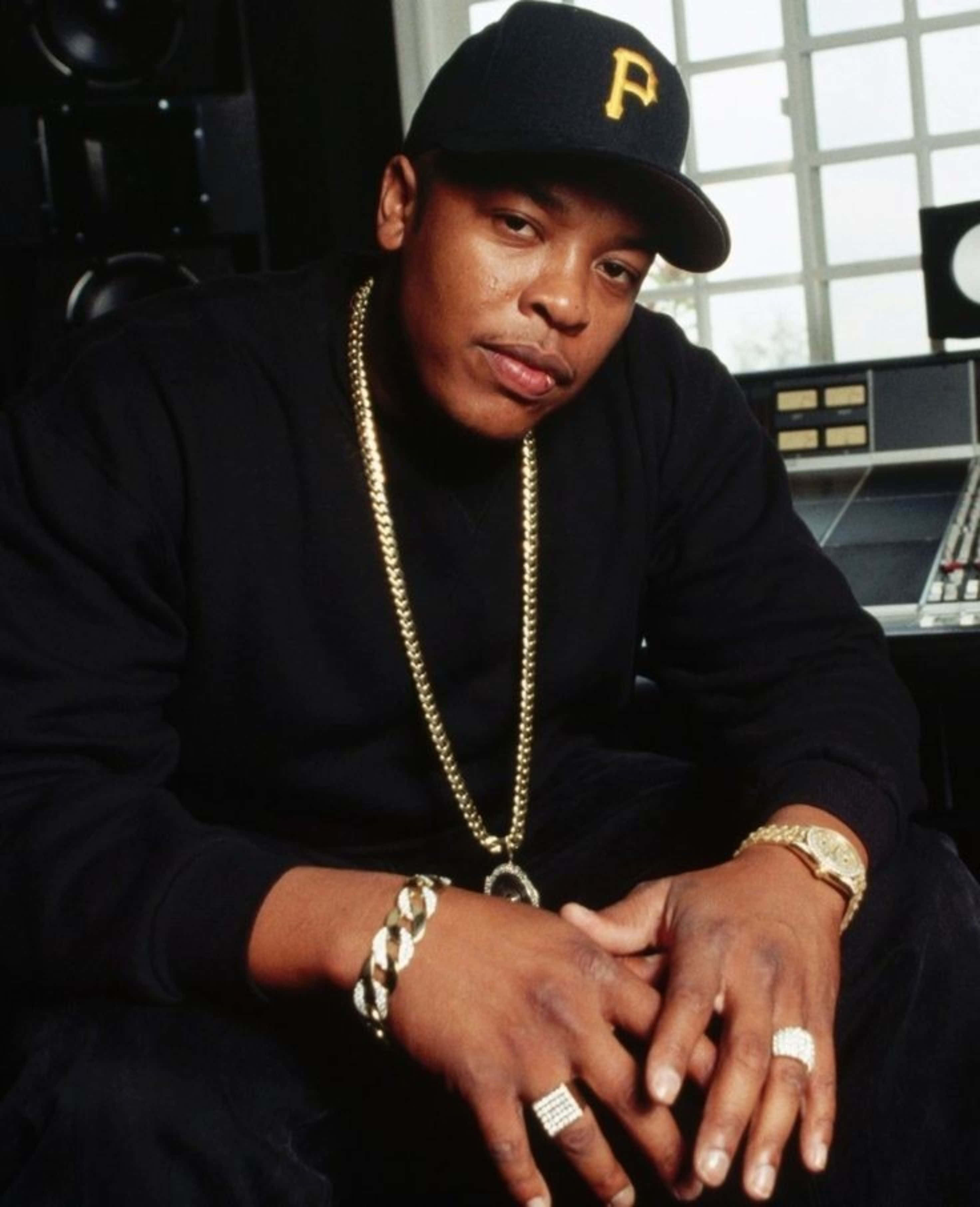 Dr. Dre In Studio - Unbridled Musical Genius At Work Background