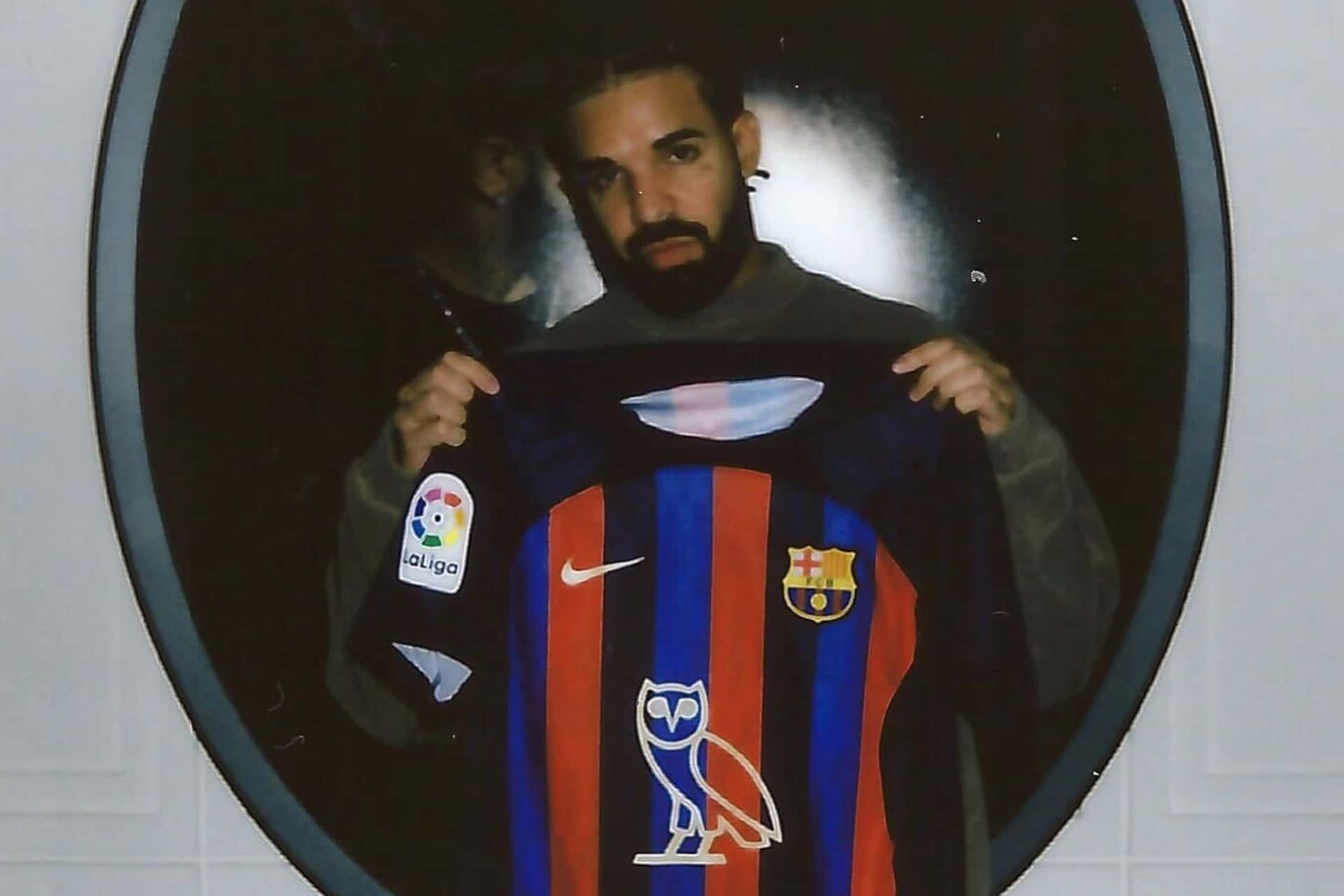 Drake Holding O V O Barcelona Jersey Background