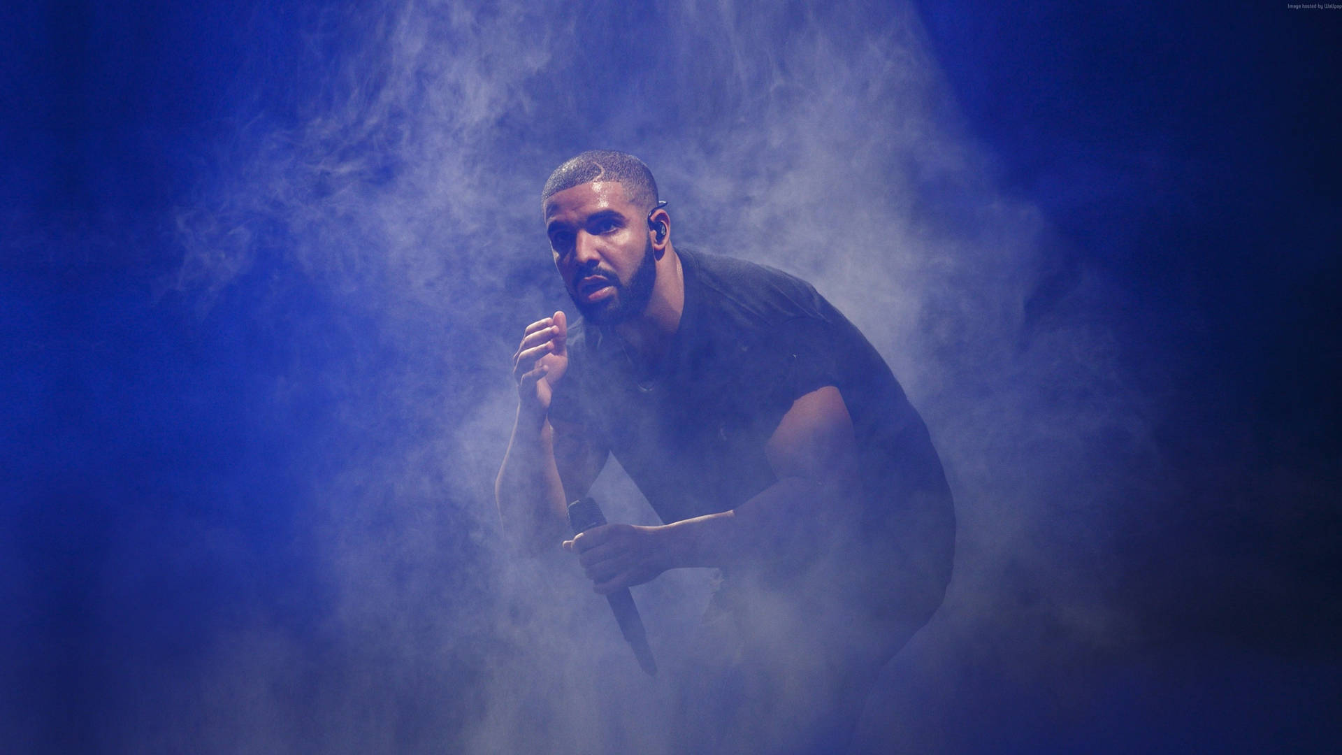 Drake Surrounded By Smoke Background