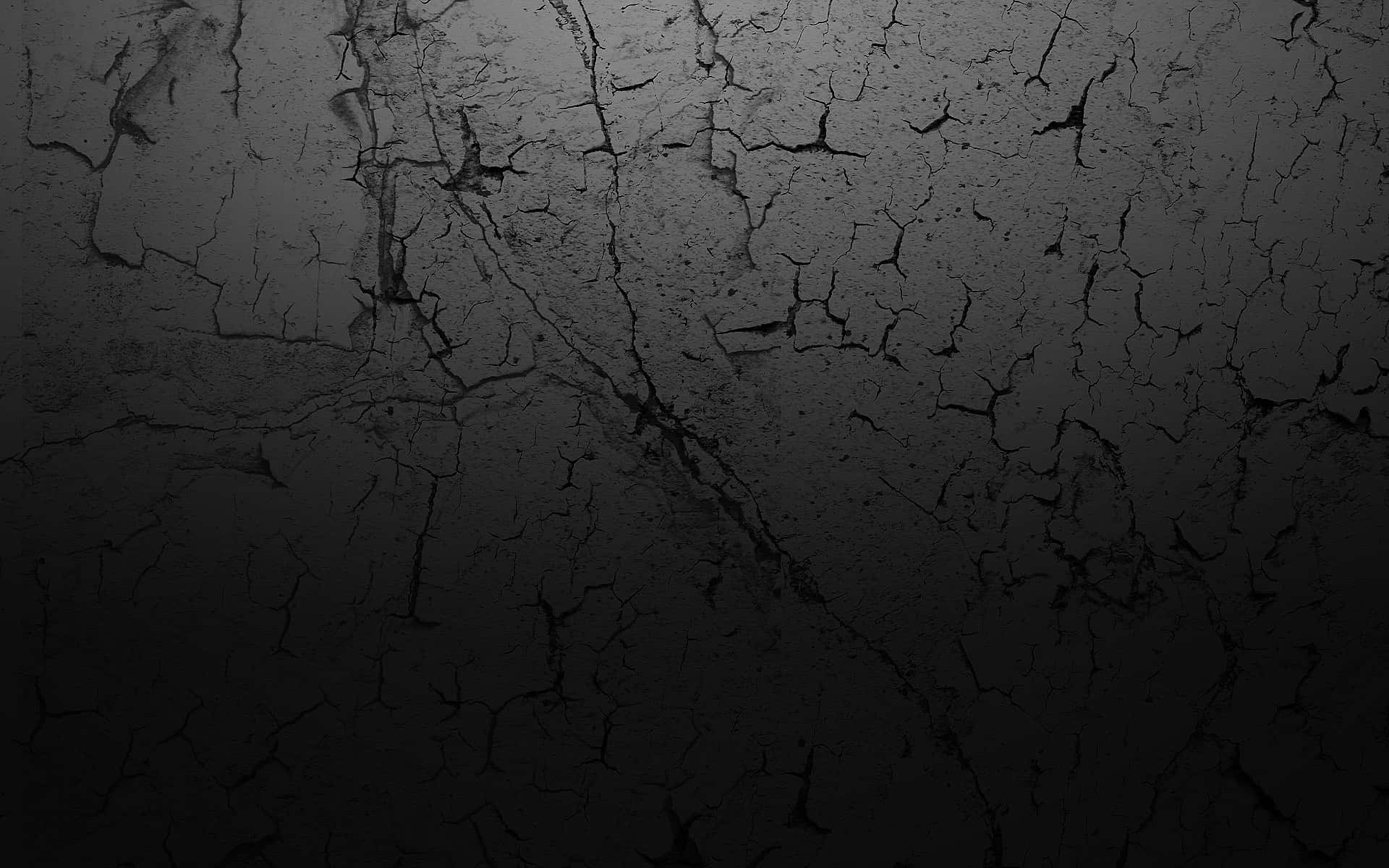 Dramatic Black Cracked Stone Texture Background