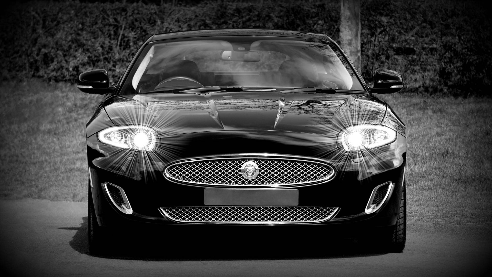 Dramatic Monochrome Jaguar Car Background