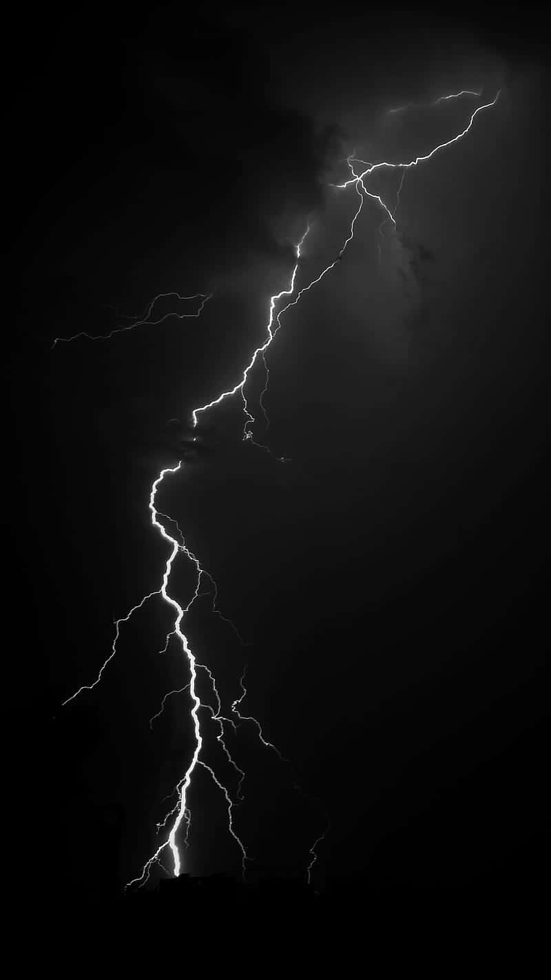 Dramatic Nighttime Lightning Strike Background