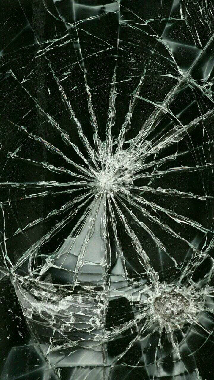 Dramatic Shattered Glass On A Dark Backdrop