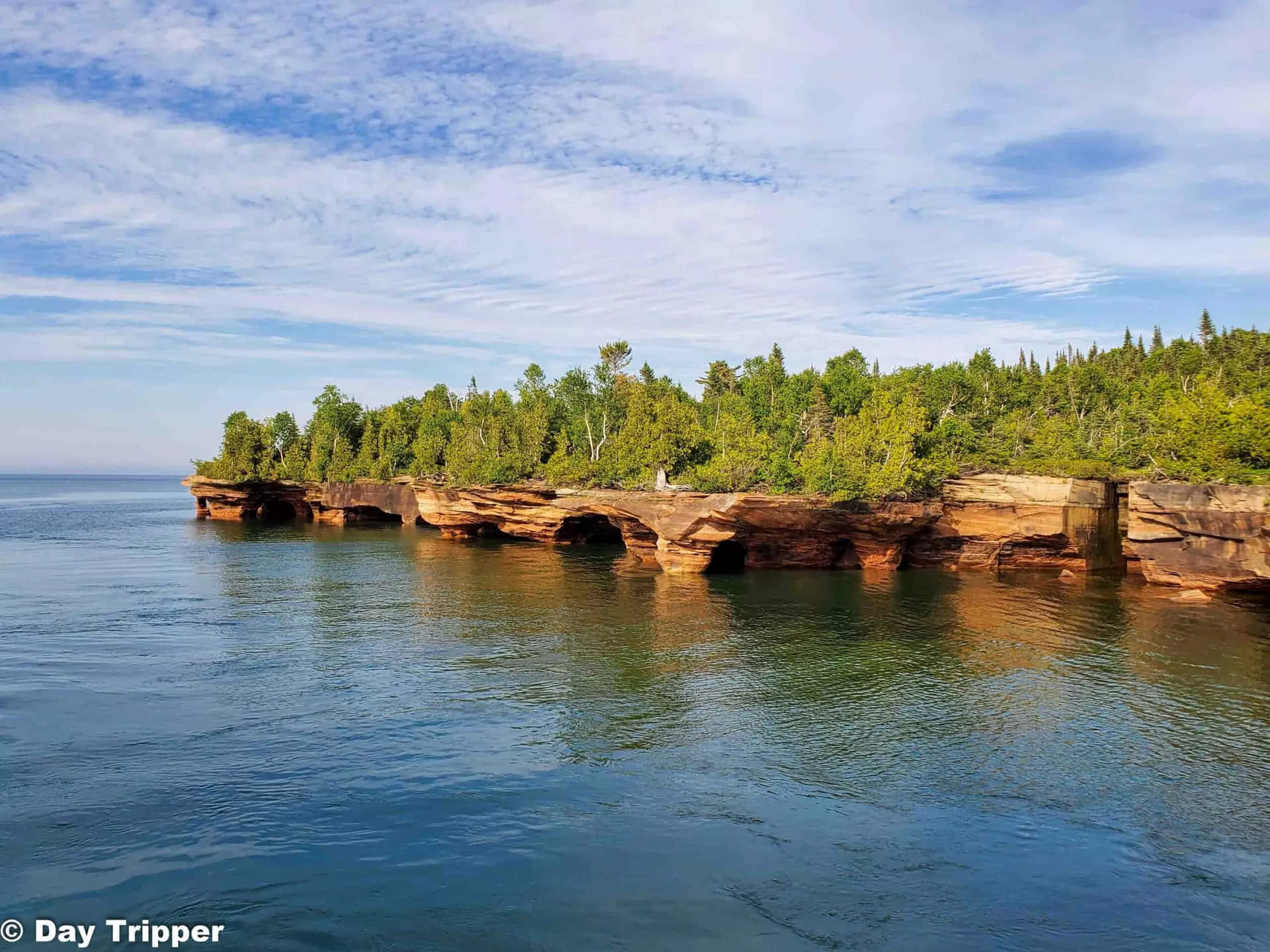 Dramatic Sunset View Of Devil's Island Background
