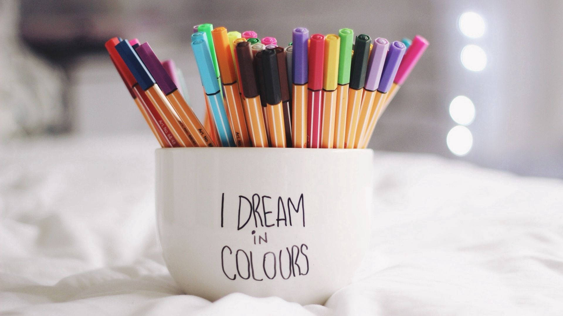Dream In Colours Mug And Pens Background