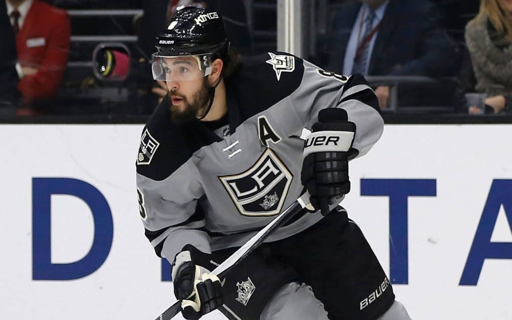 Drew Doughty Intensely Focused During A Hockey Match. Background