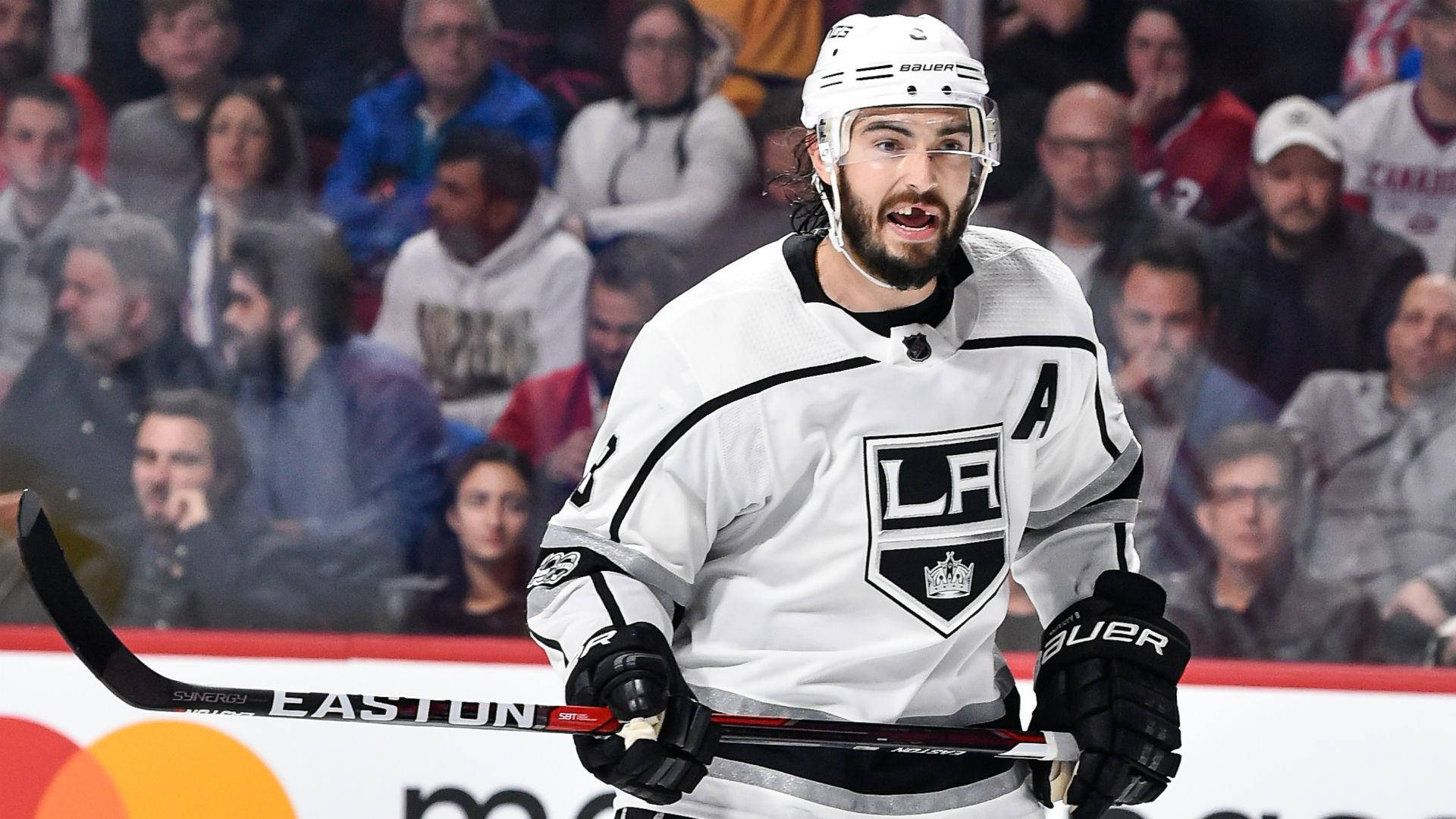 Drew Doughty With Mouth Open During Game Background