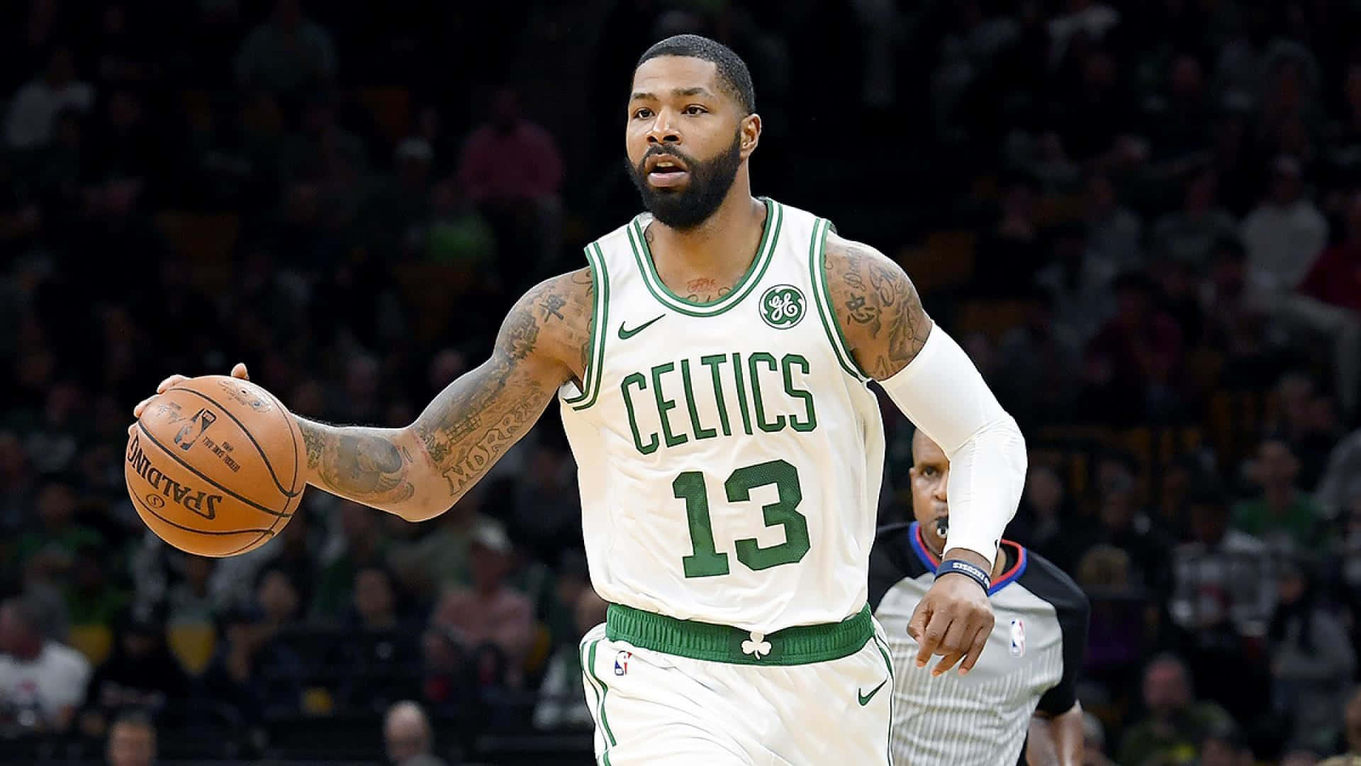 Dribbling Boston Celtics Power Forward Marcus Morris