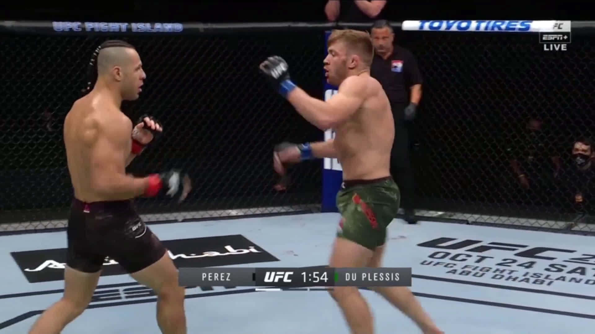 Dricus Du Plessis And Opponent In The Ring