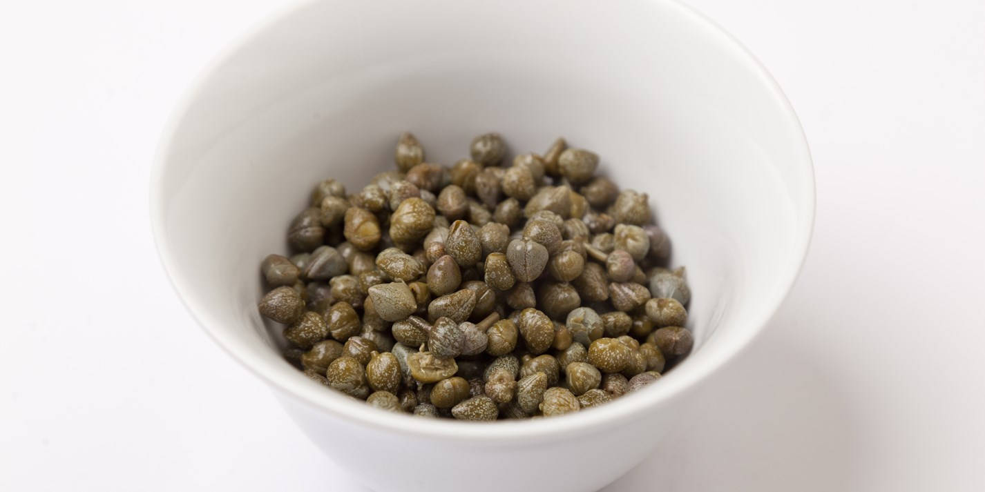 Dried Dark Green Capers In Bowl