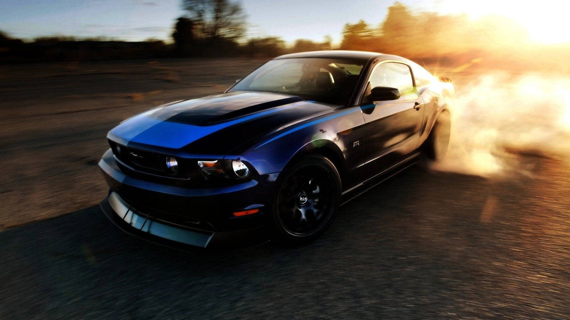 Drifting Blue Ford Mustang Background