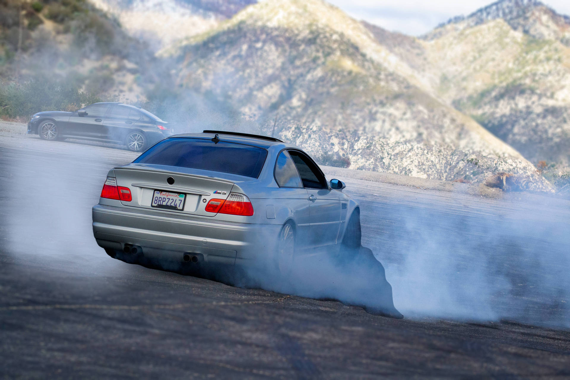 Drifting Car To Mountains Background