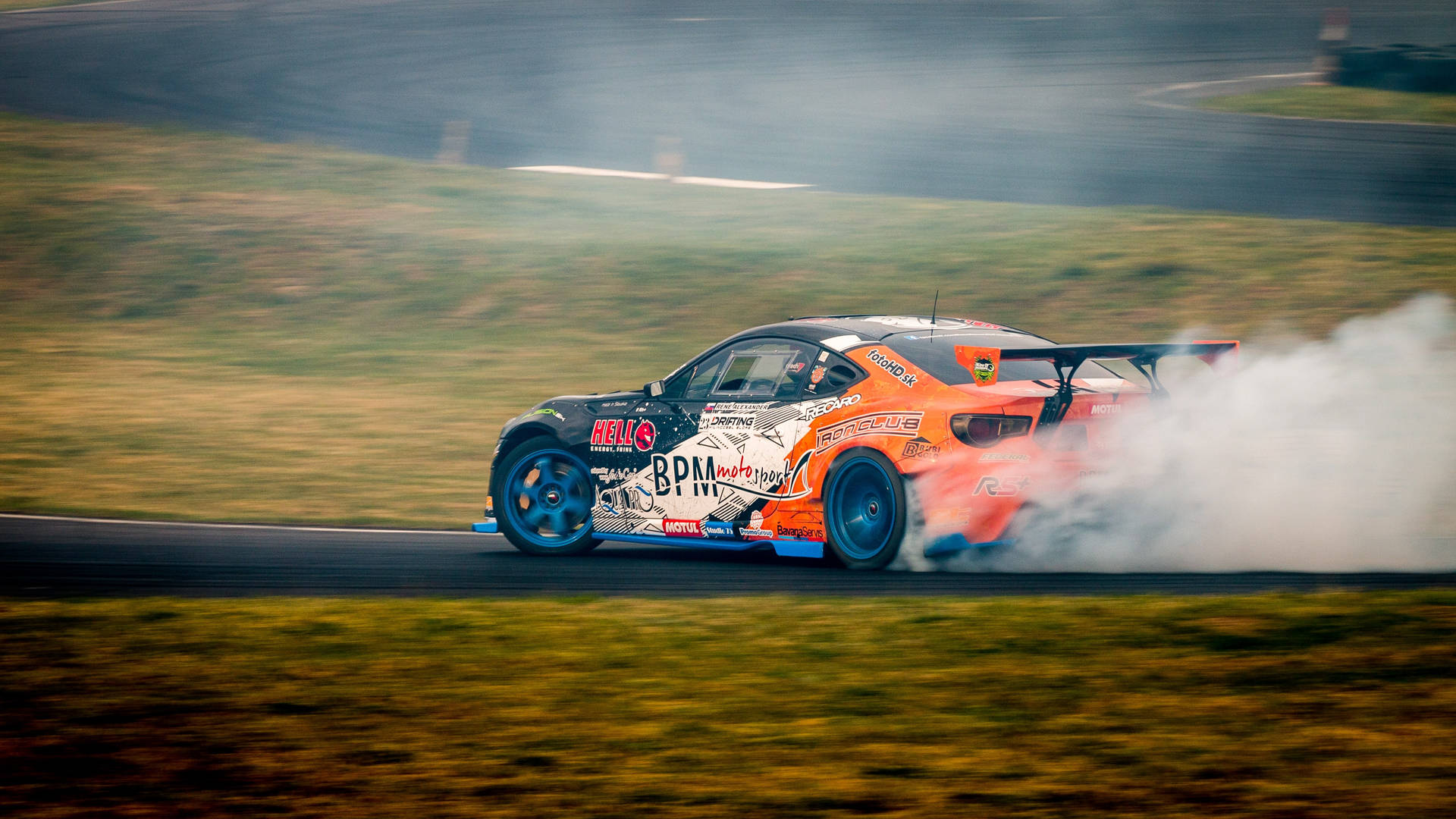 Drifting Orange Car Background