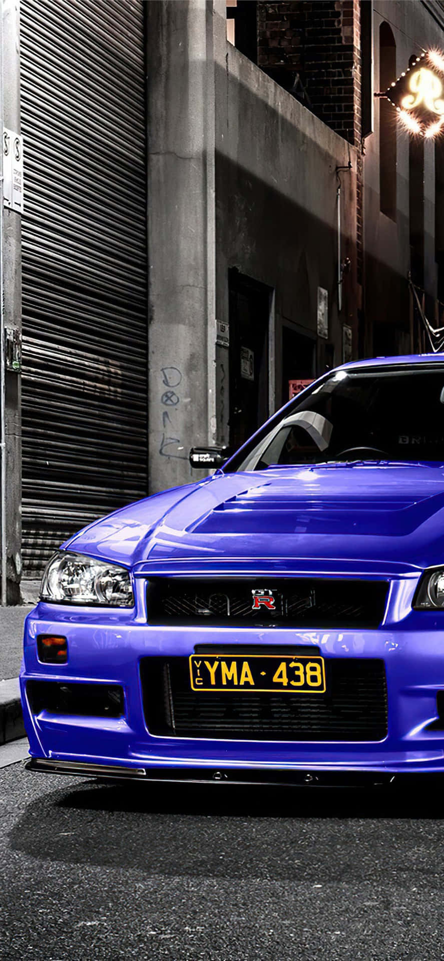 Driving A New Level Of Speed And Style With The Nissan Skyline Iphone. Background