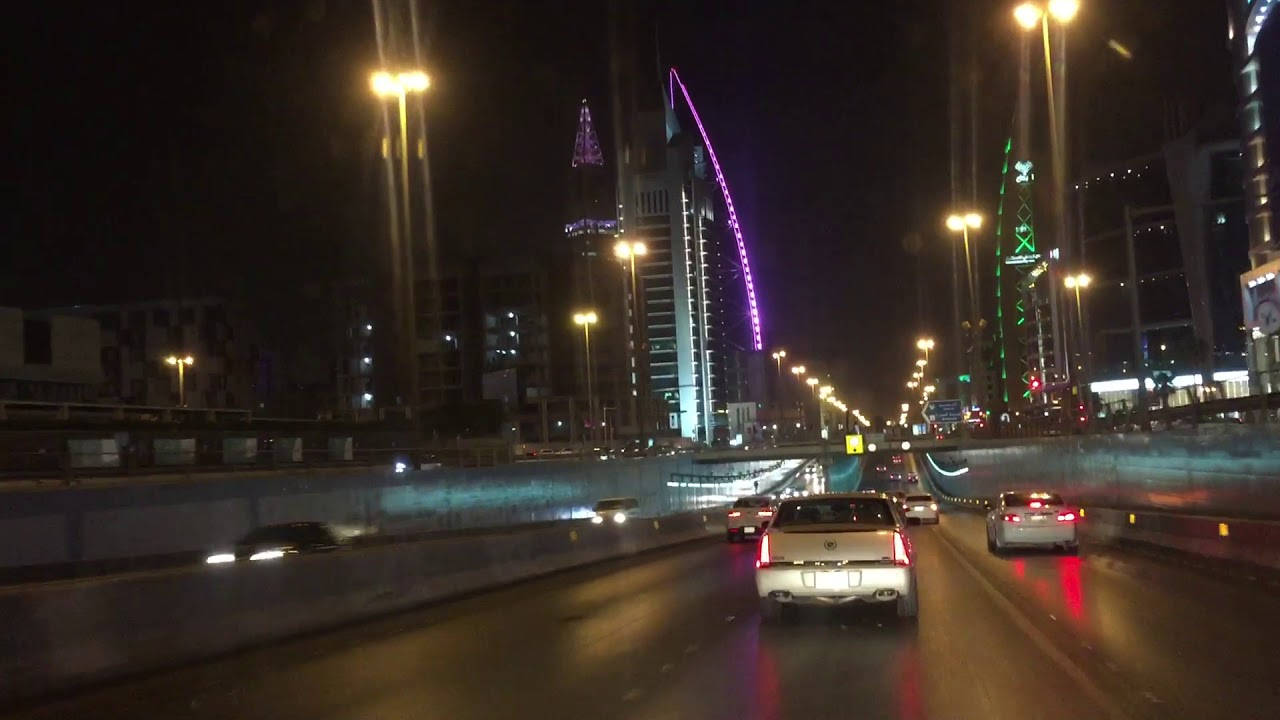 Driving At Night In Riyadh Background