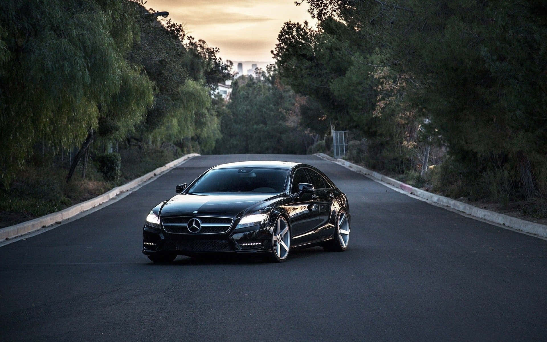 Driving Elegance In Black – The Mercedes Black Background