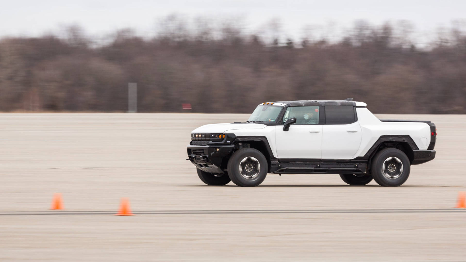 Driving Power: Hummer Dominates The Tarmac Background