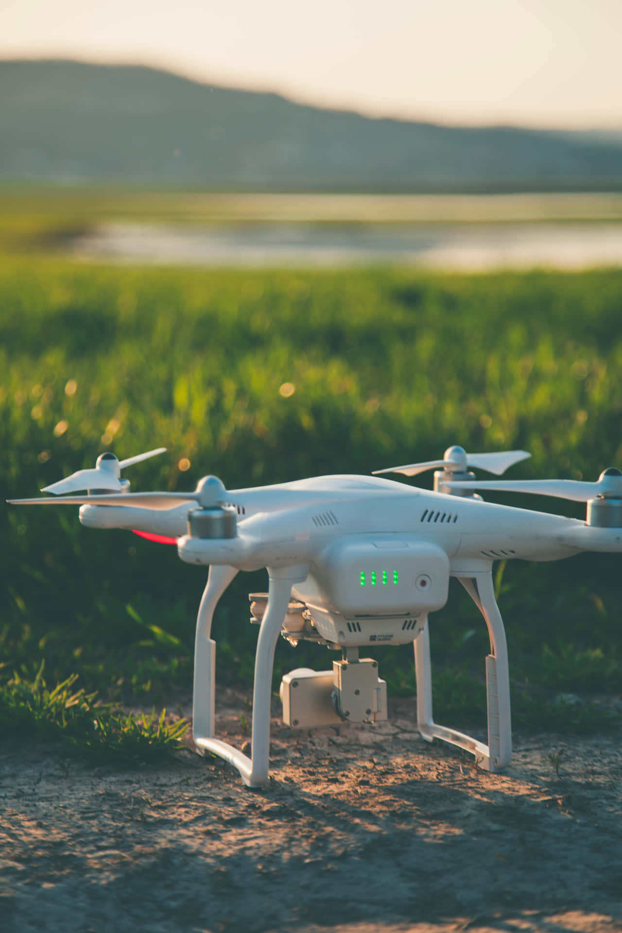 Drone Readyfor Takeoffat Sunset Background